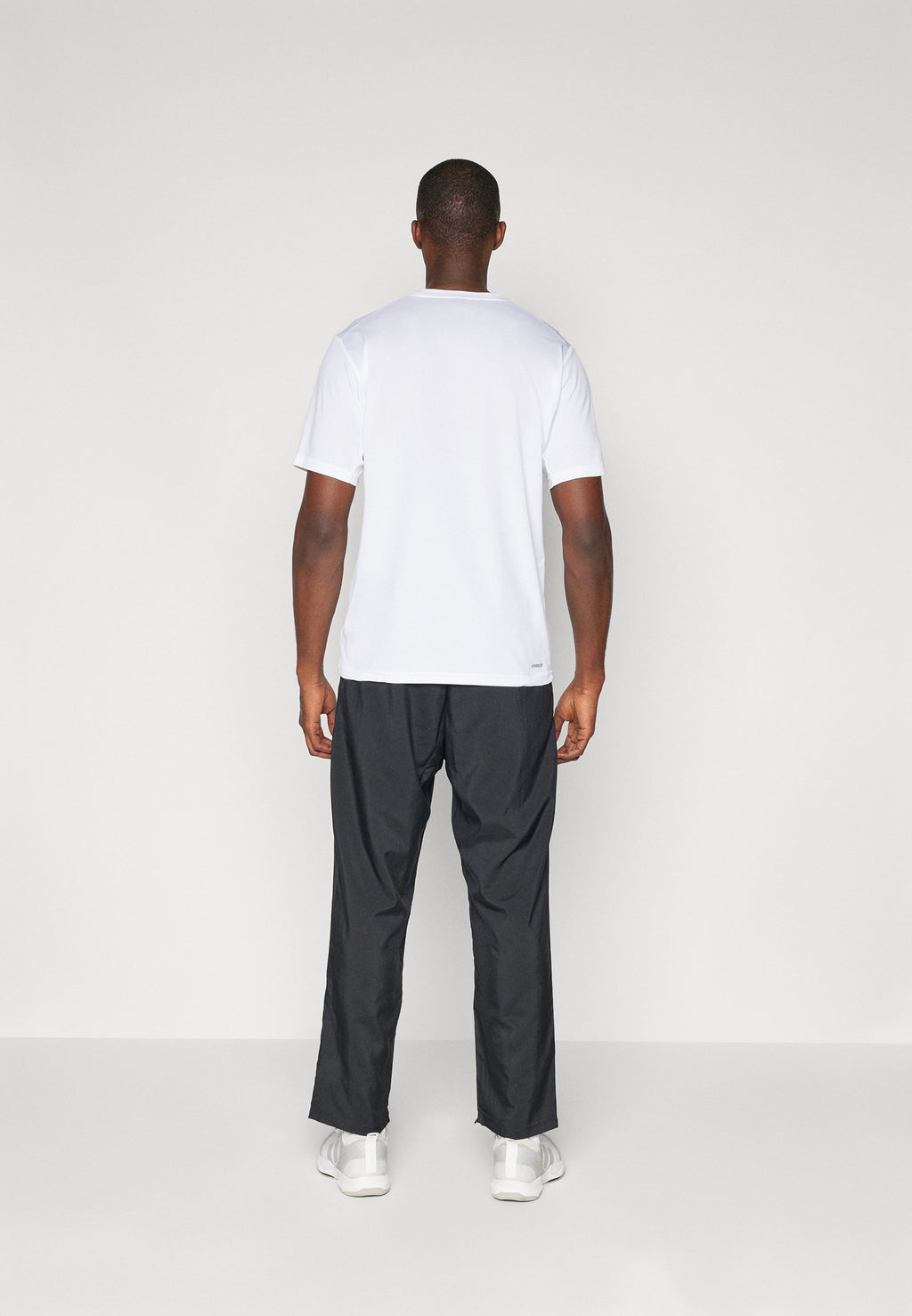 ESSENTIAL SMALL LOGO STANFORD  OPEN HEM - Trousers - black/white