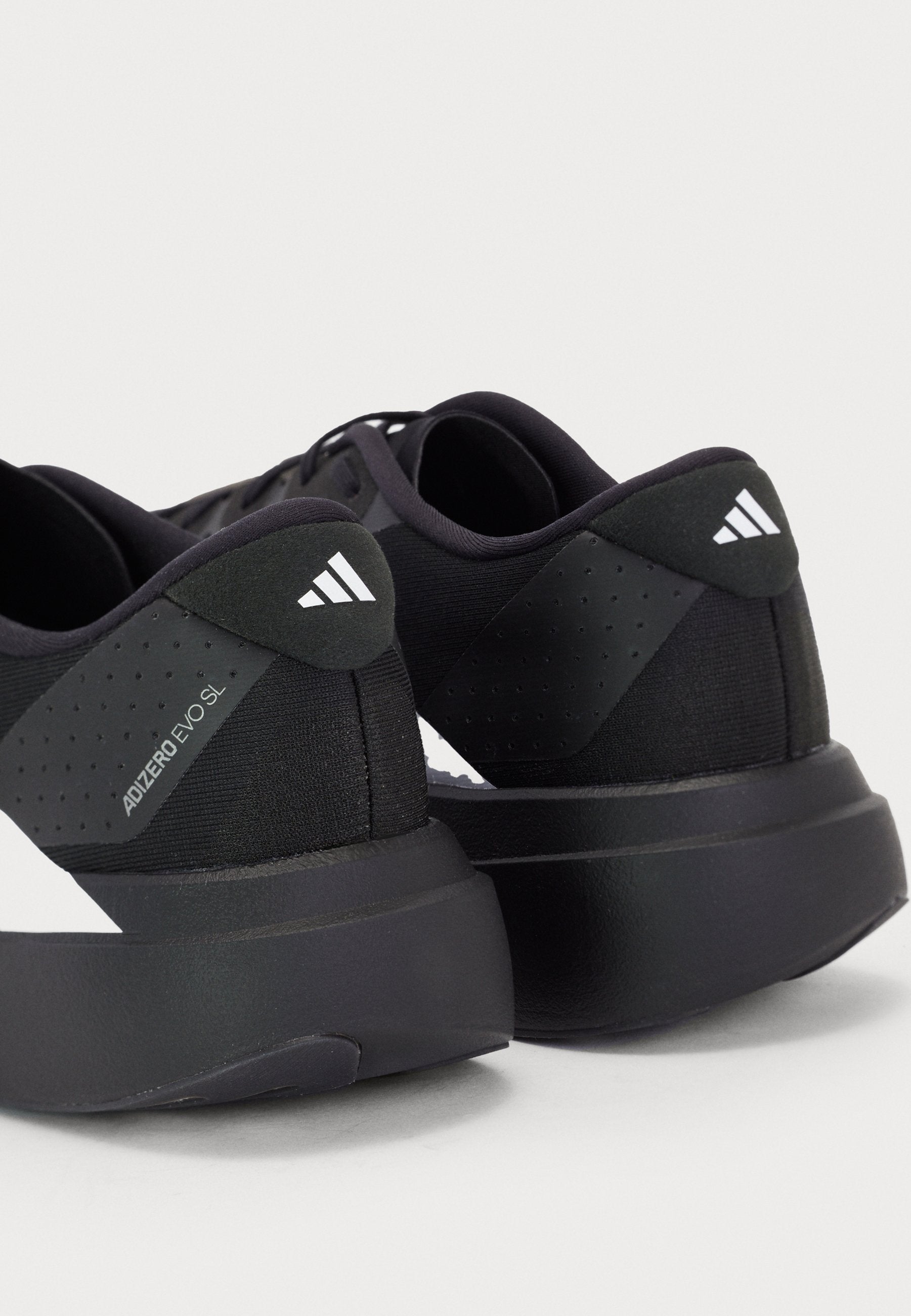 ADIZERO EVO SL M - Trainers - core black/footwear white