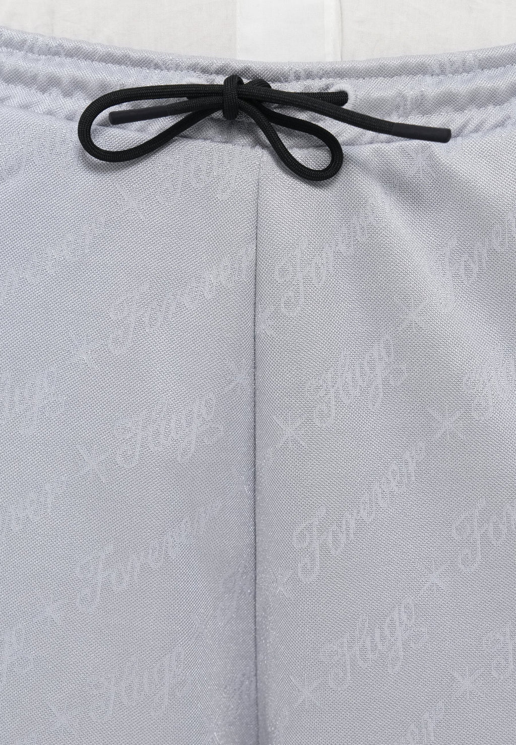 NICOLE - Tracksuit bottoms - silver-coloured