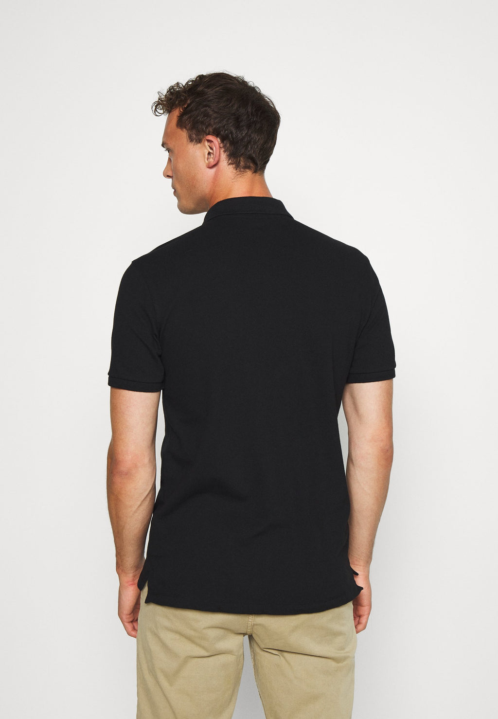 STRETCH SOLID - Polo shirt - true black