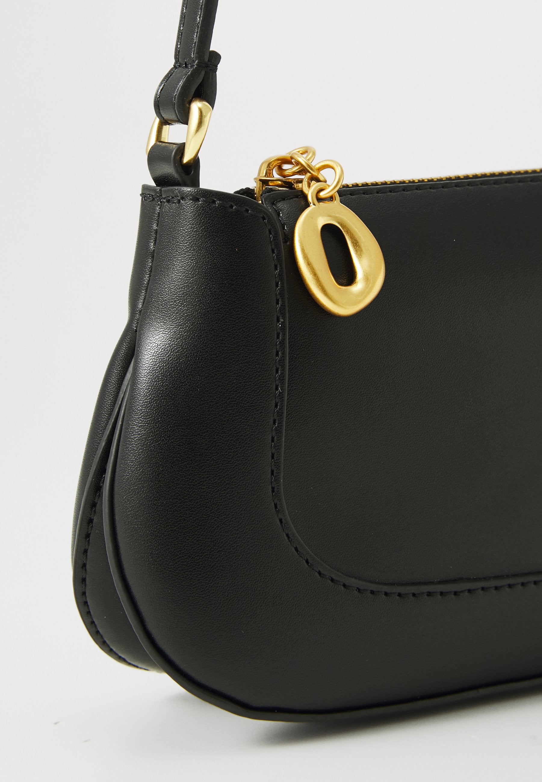 ENGRAVED - Cross body bag - black