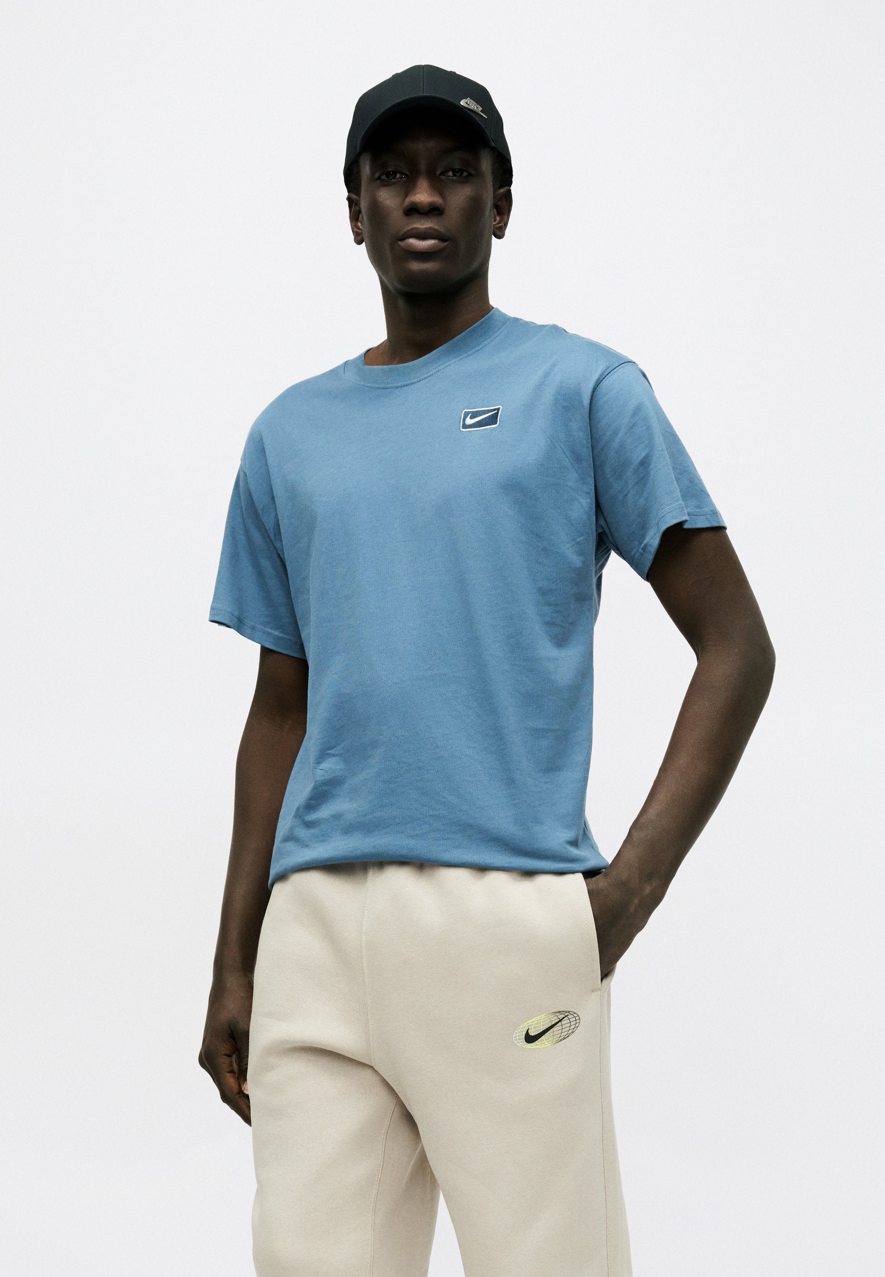 CLUB - Tracksuit bottoms - cream