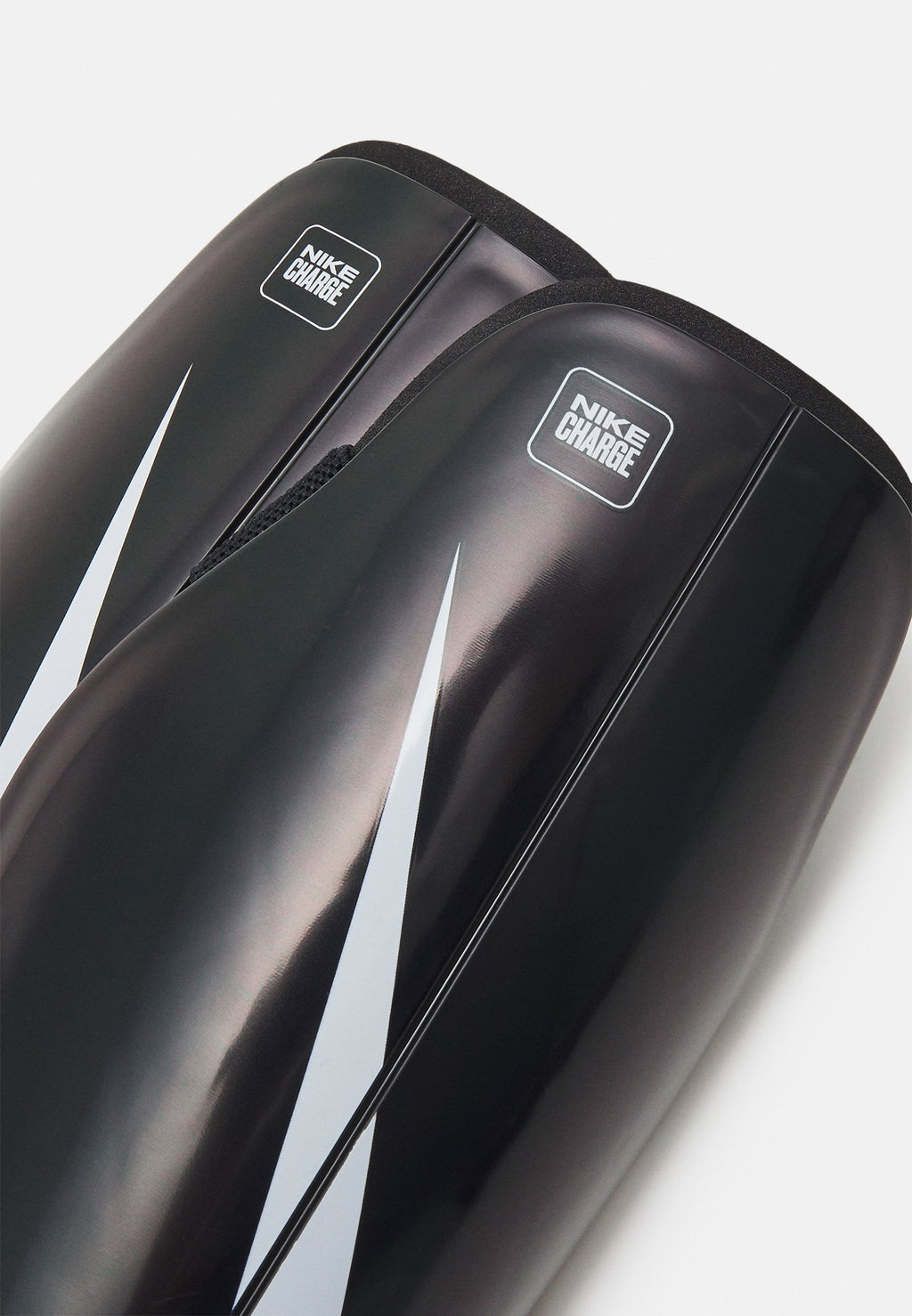 CHARGE - Shin pads - schwarz/weiss