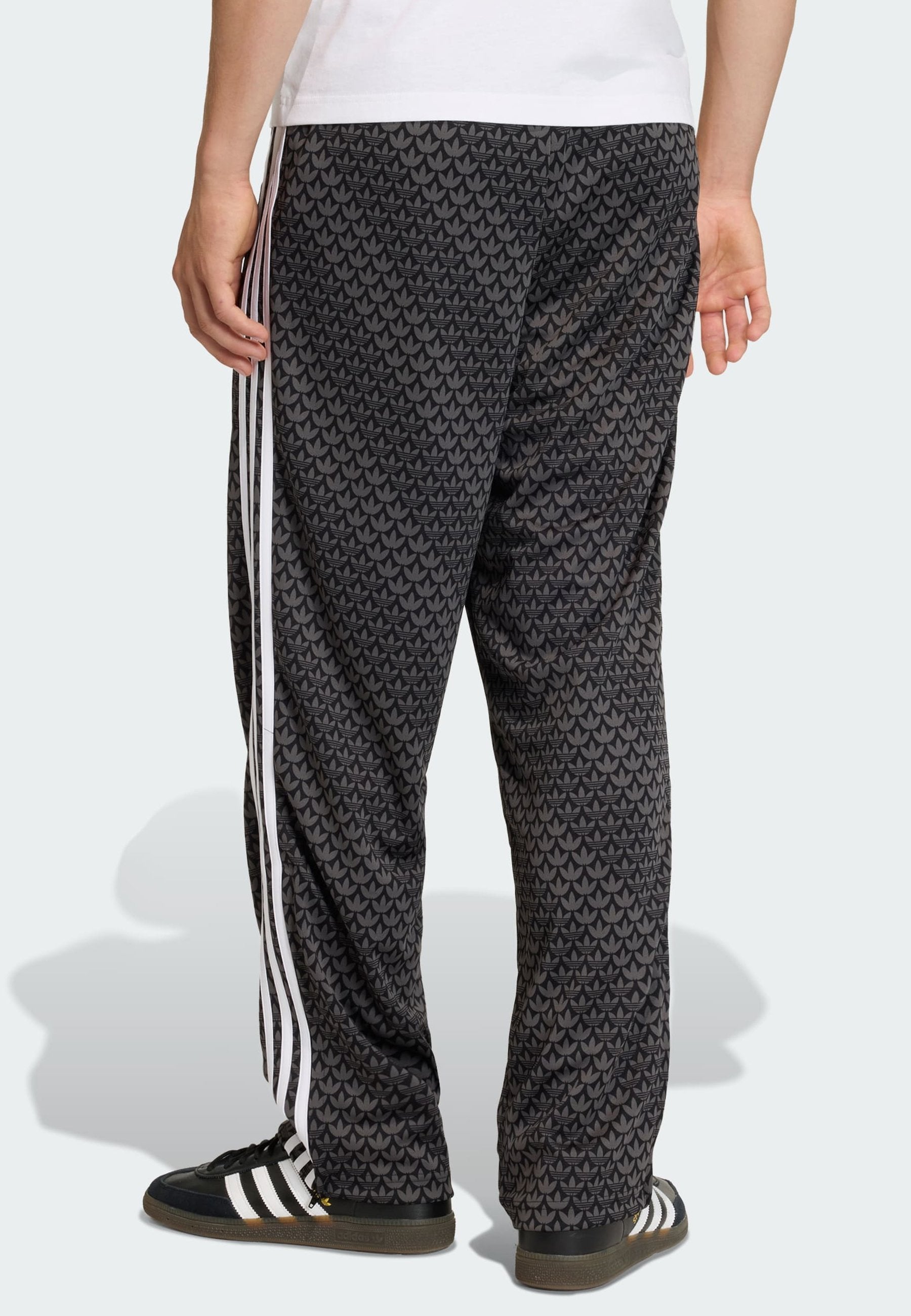 FIREBIRD MONOGRAM - Tracksuit bottoms - black