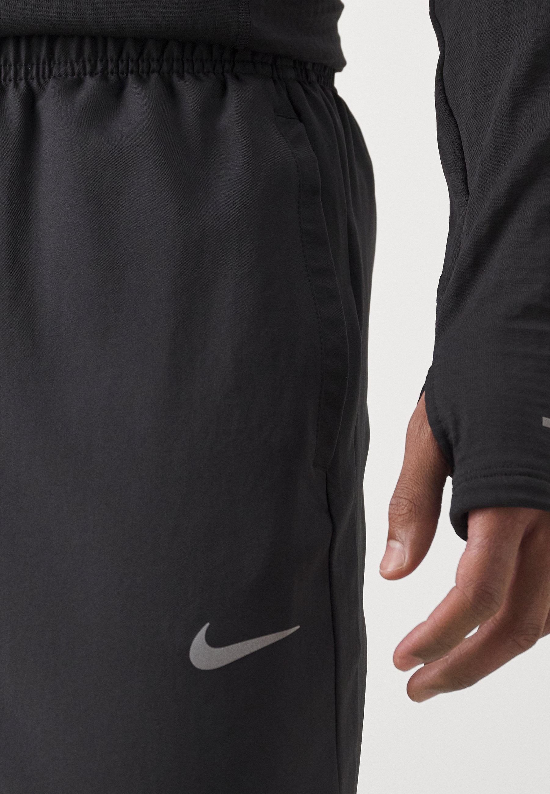 M NK DF CHALLENGR WVN PANT - Tracksuit bottoms - black/silver