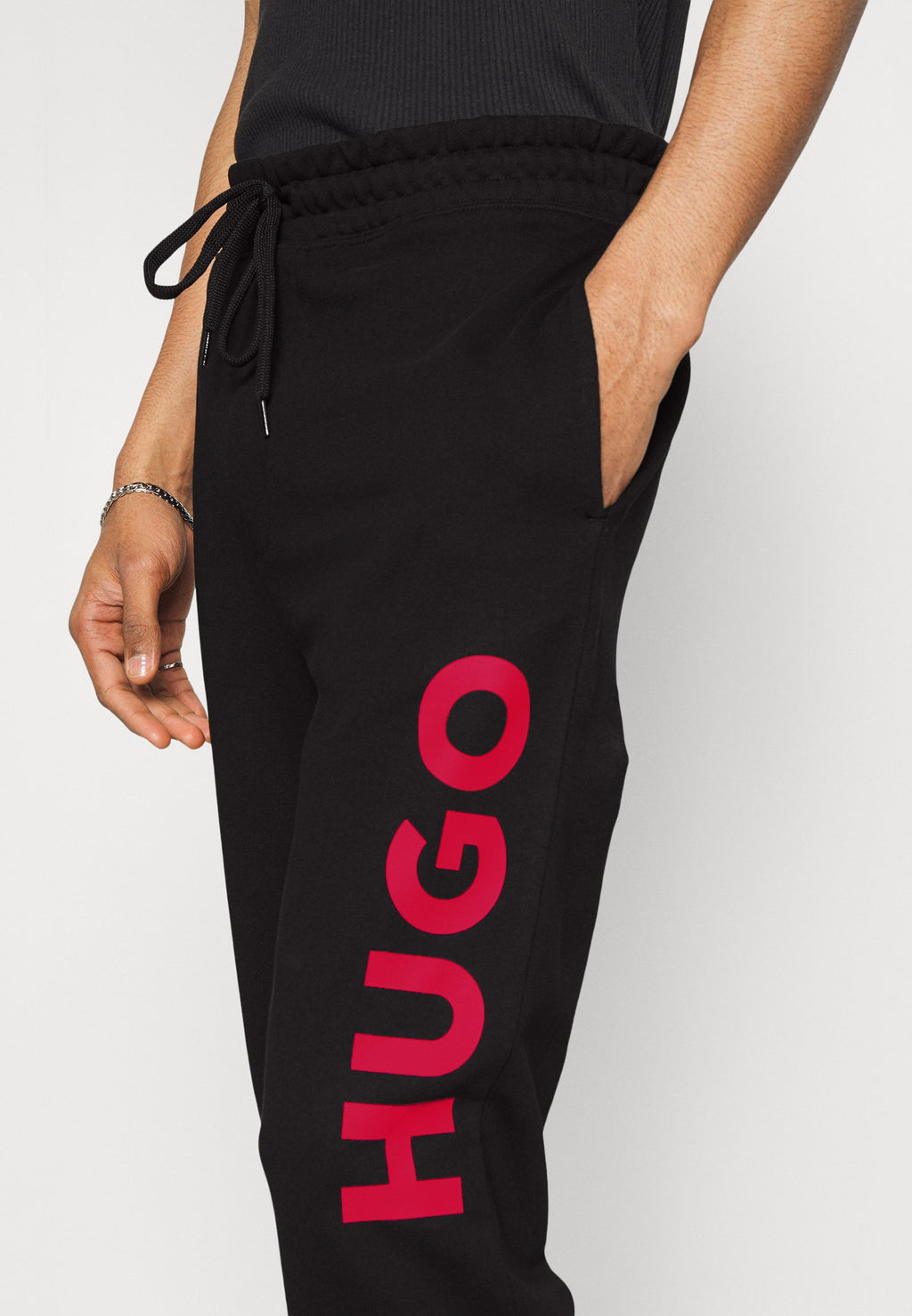 DUTSCHI - Tracksuit bottoms - black