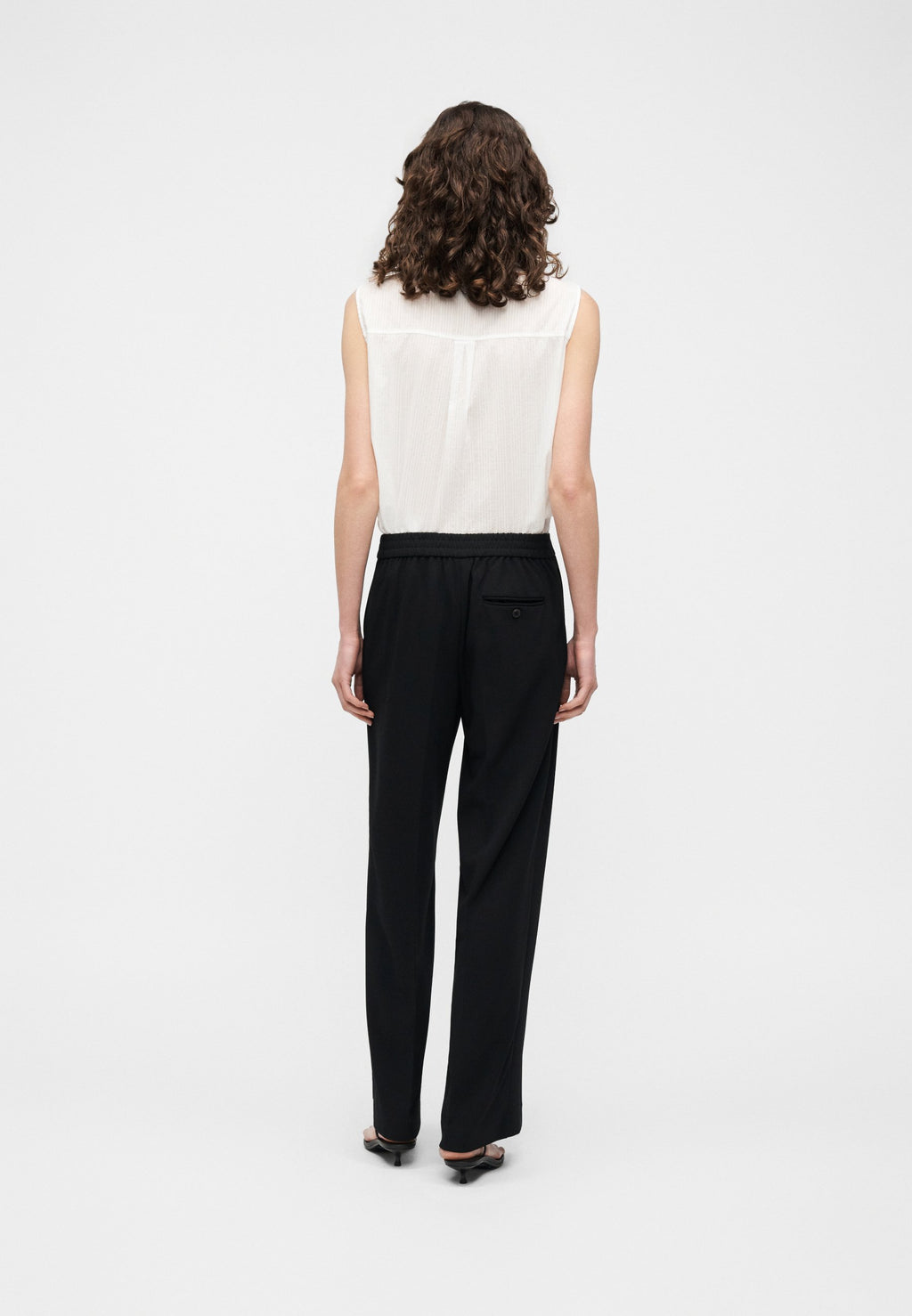 TRAVEL PANT - Trousers - black