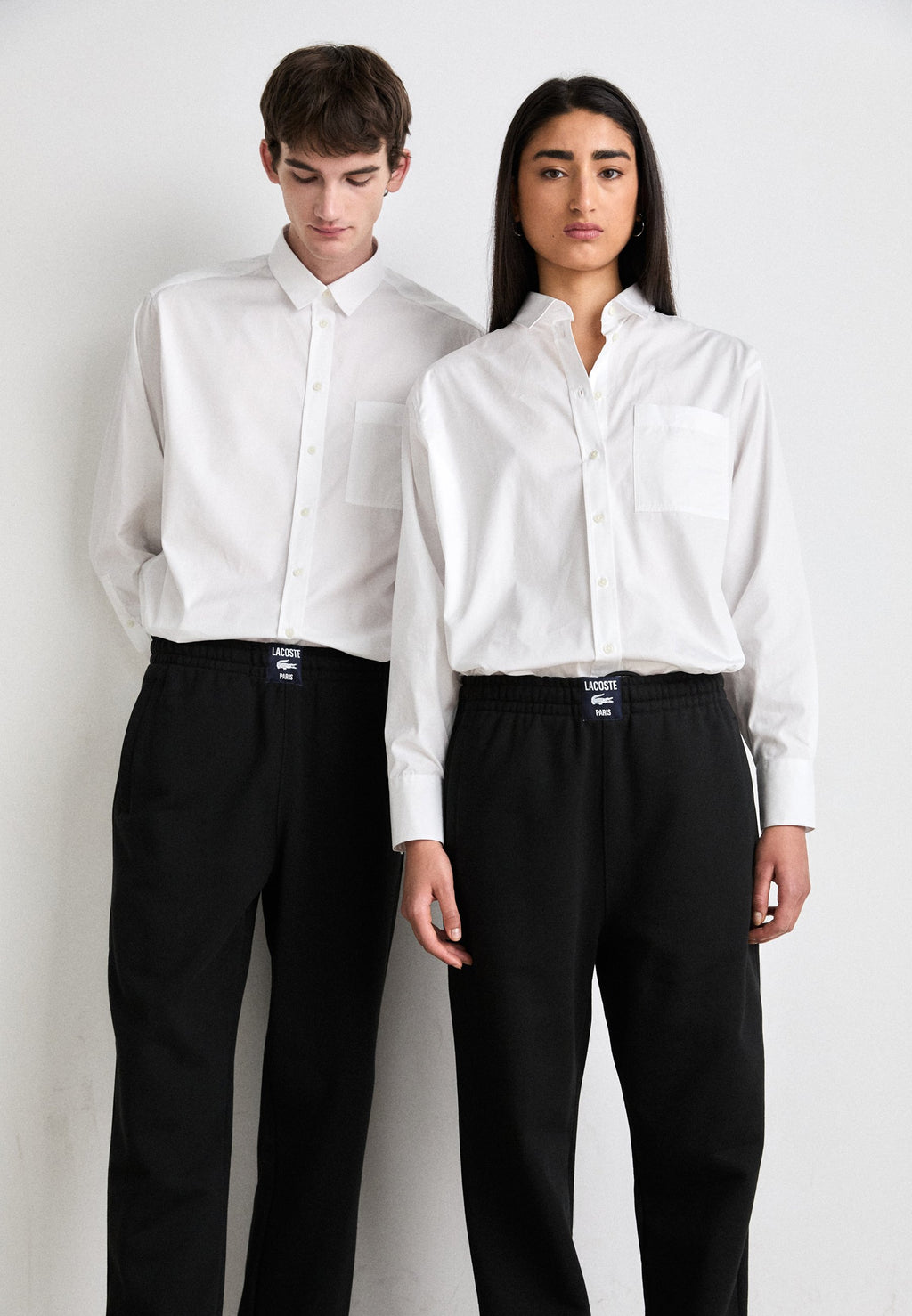 UNISEX - Tracksuit bottoms - black
