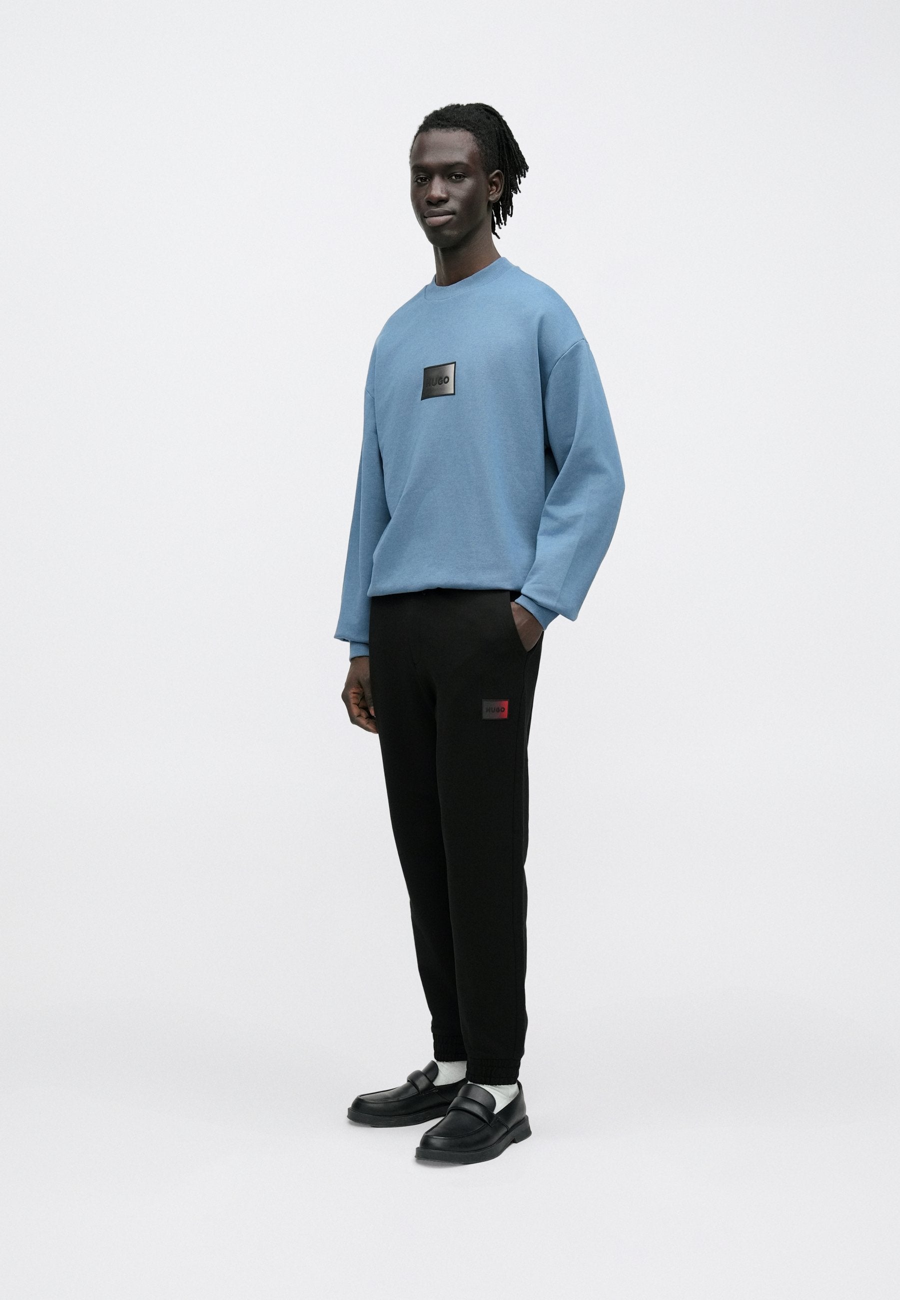 DANOPAN - Tracksuit bottoms - black