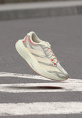 ADIZERO EVO SL EXO W - Road running shoes - off white/white/shadow red