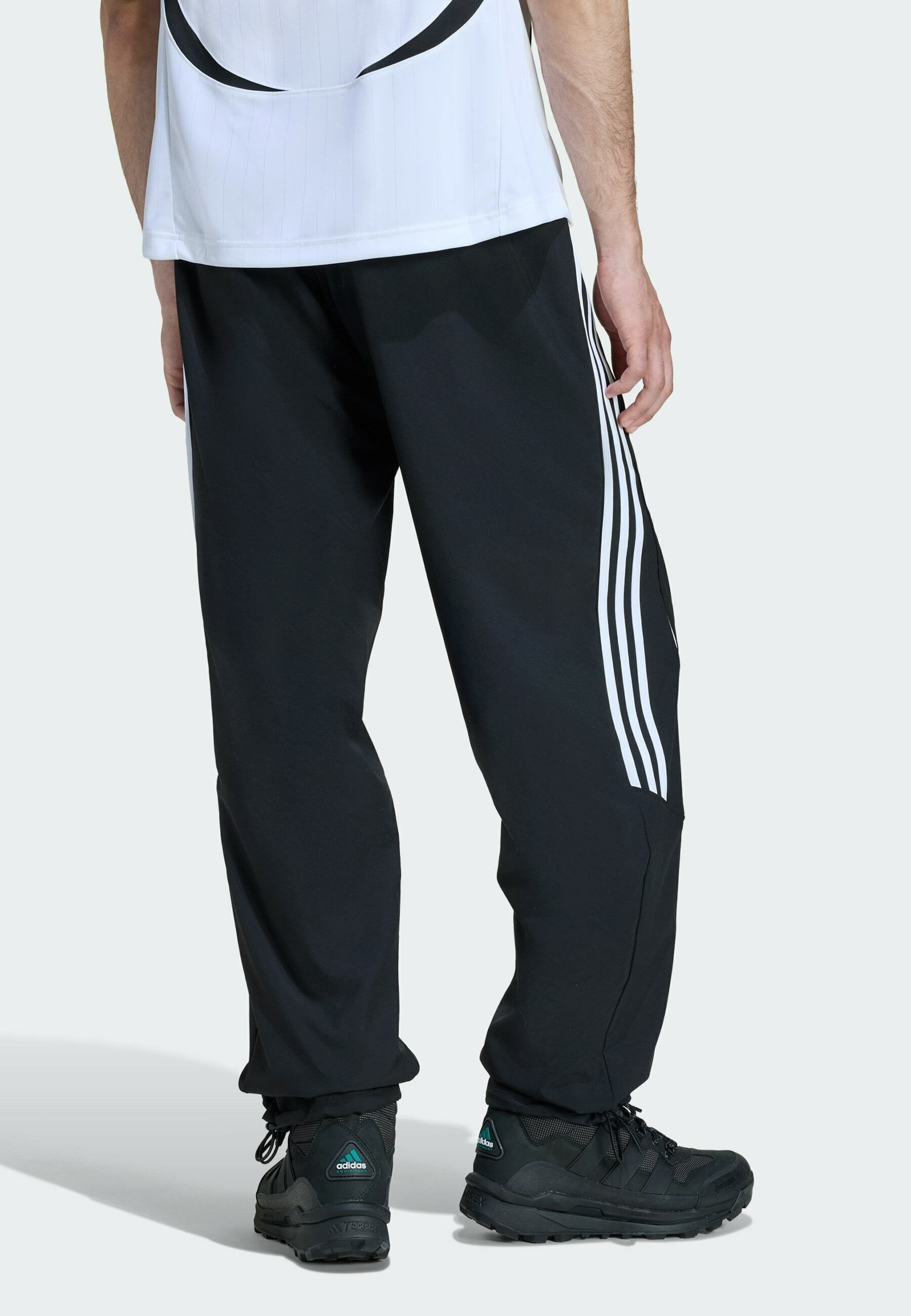 TEAMGEIST - Tracksuit bottoms - black   black   white