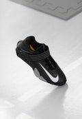 SAVALEOS - Training shoe - black/white/grey fog/laser orange