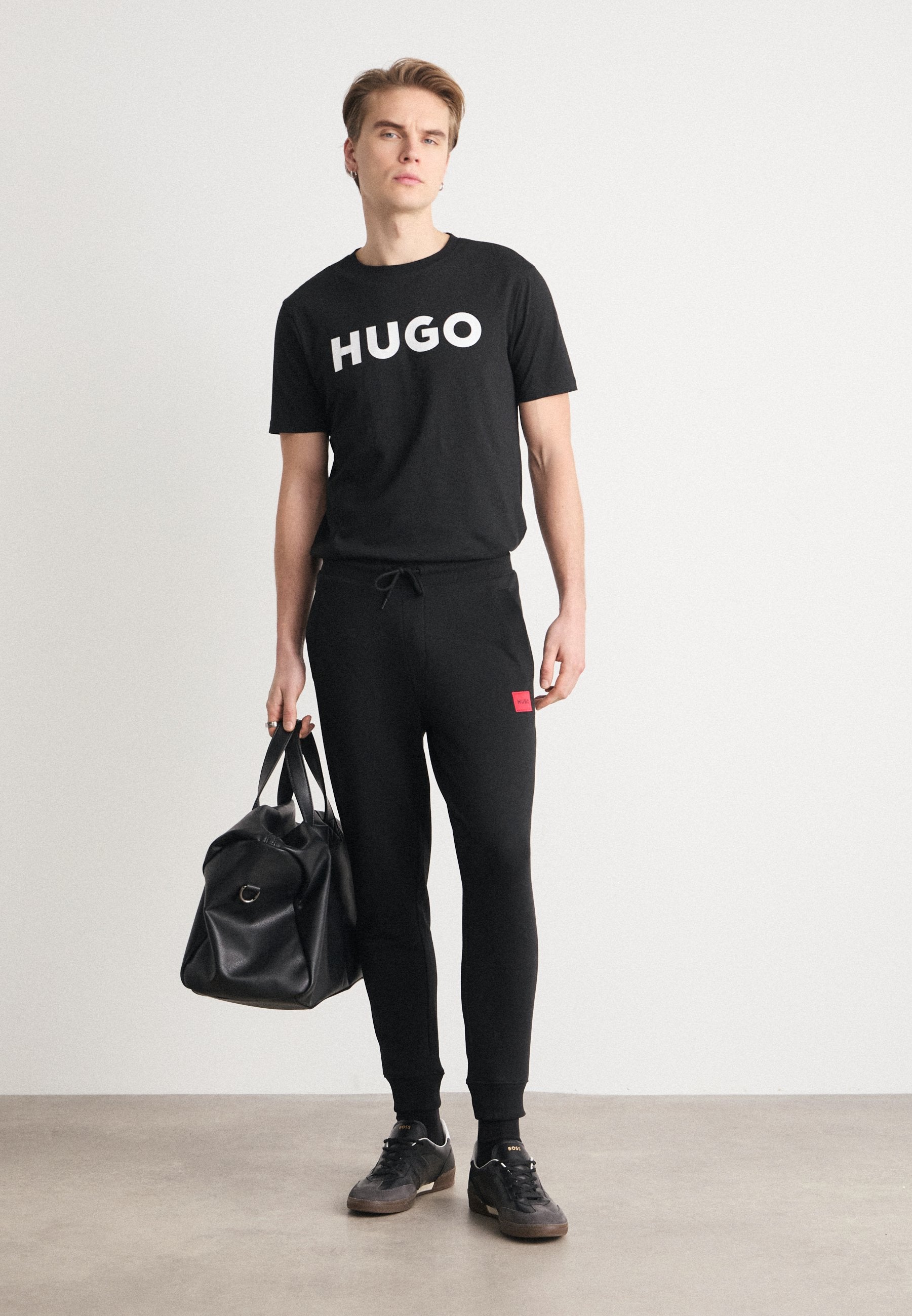 DOAK - Tracksuit bottoms - black