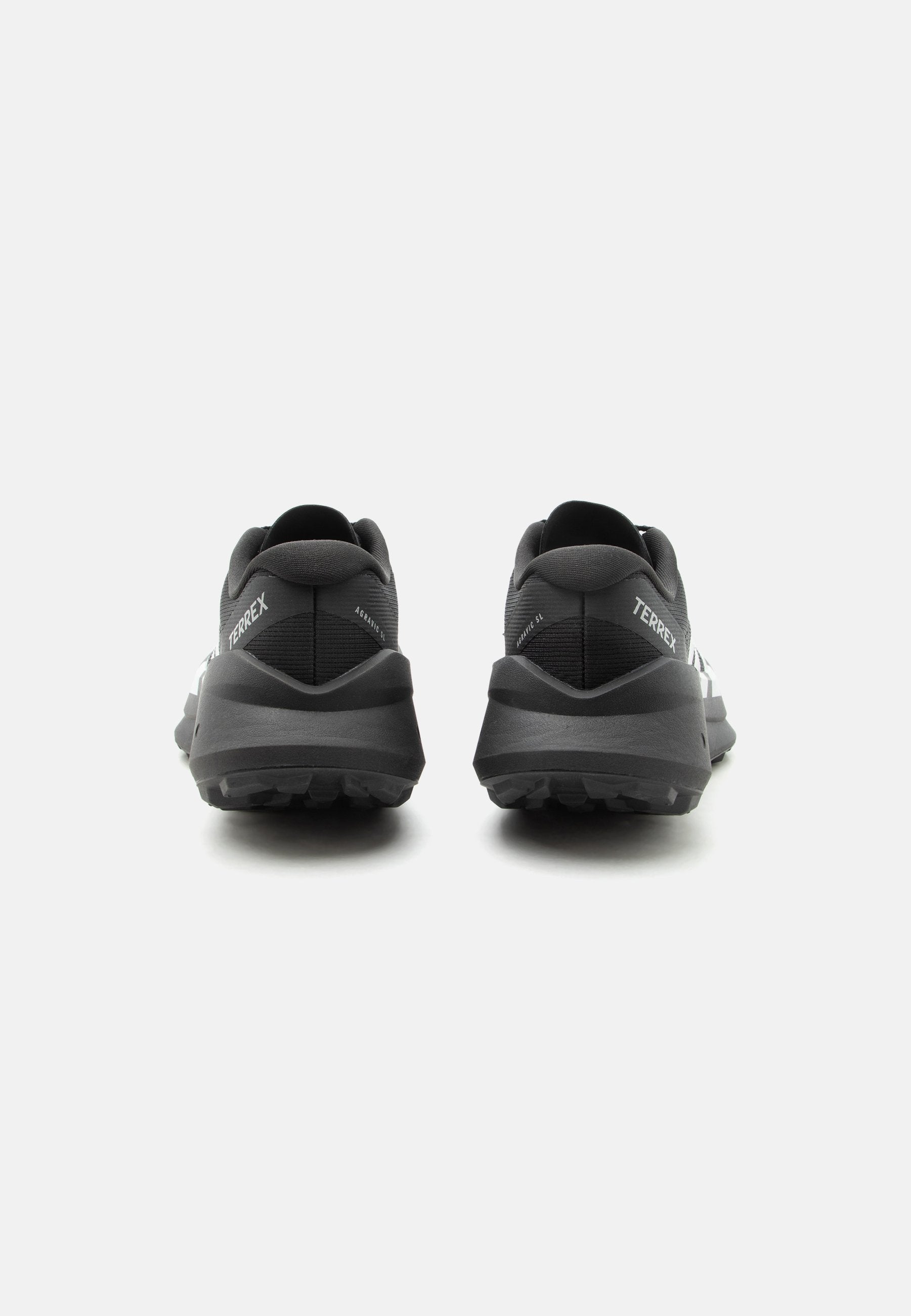 AGRAVIC - Trail running shoes - core black/grey two