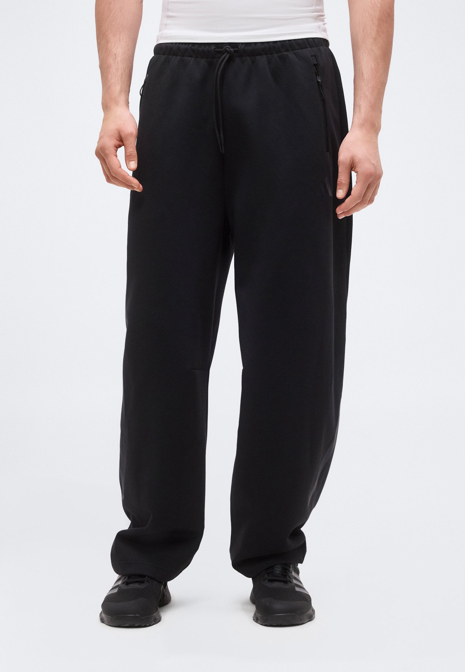 Z.N.E. OPEN HEM - Tracksuit bottoms - black