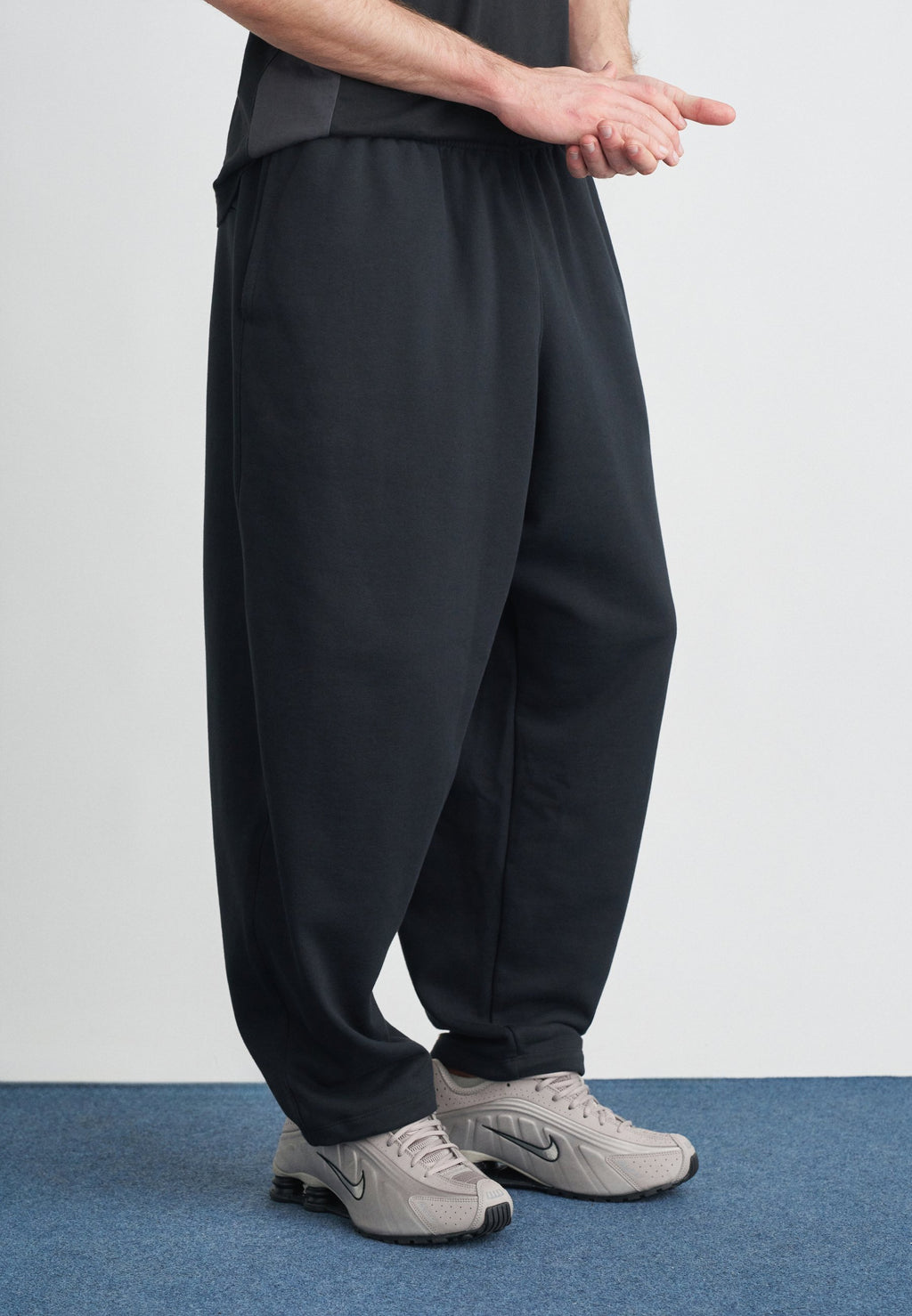 CLUB - Tracksuit bottoms - black/white