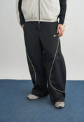 TOBI - Tracksuit bottoms - black/volt ice/cream