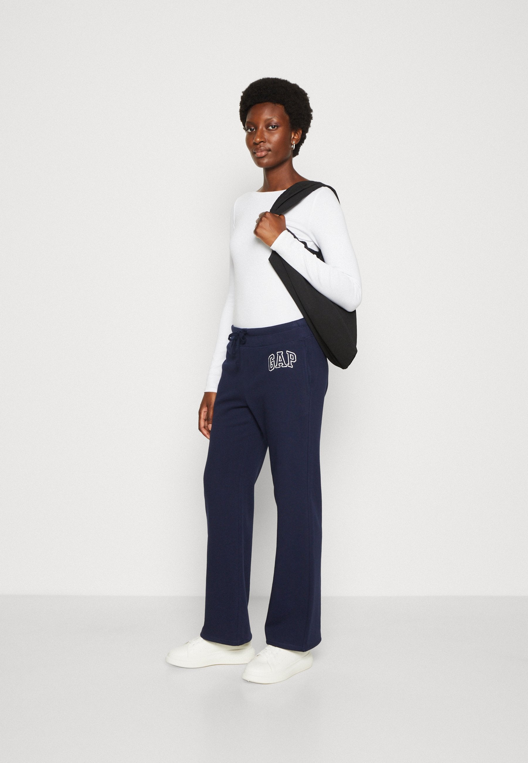 HERITAGE - Tracksuit bottoms - navy