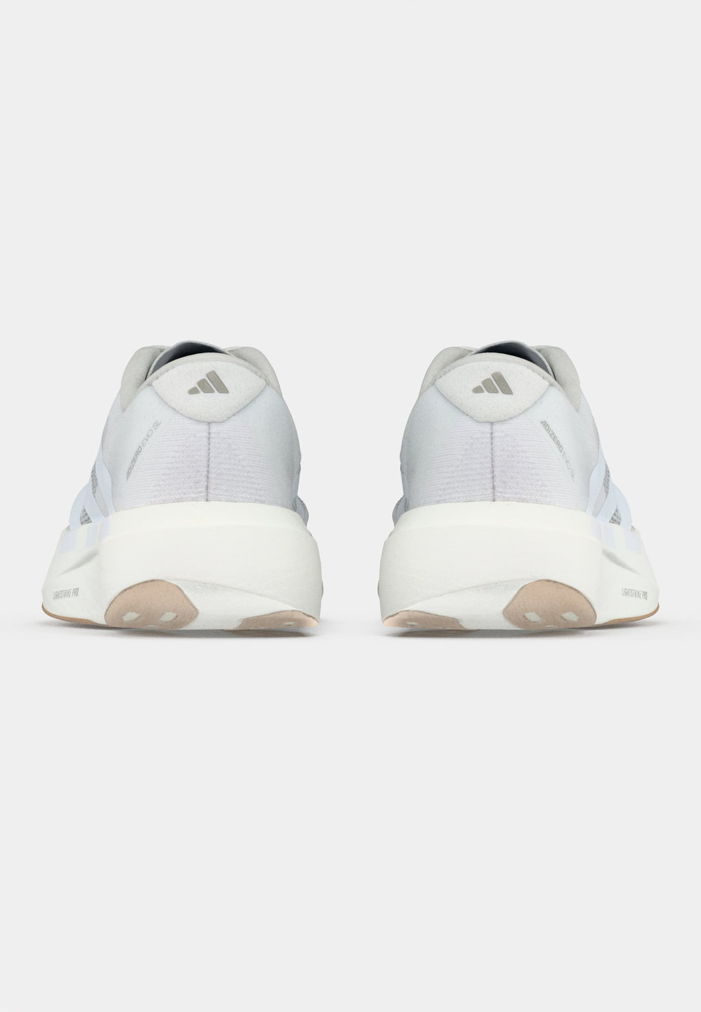 ADIZERO EVO SL W - Trainers - footwear white/warm sandstone