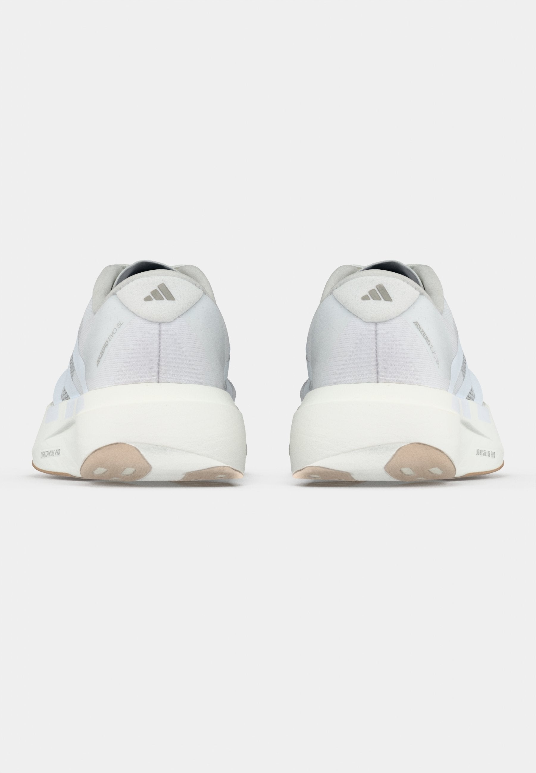 ADIZERO EVO SL W - Trainers - footwear white/warm sandstone
