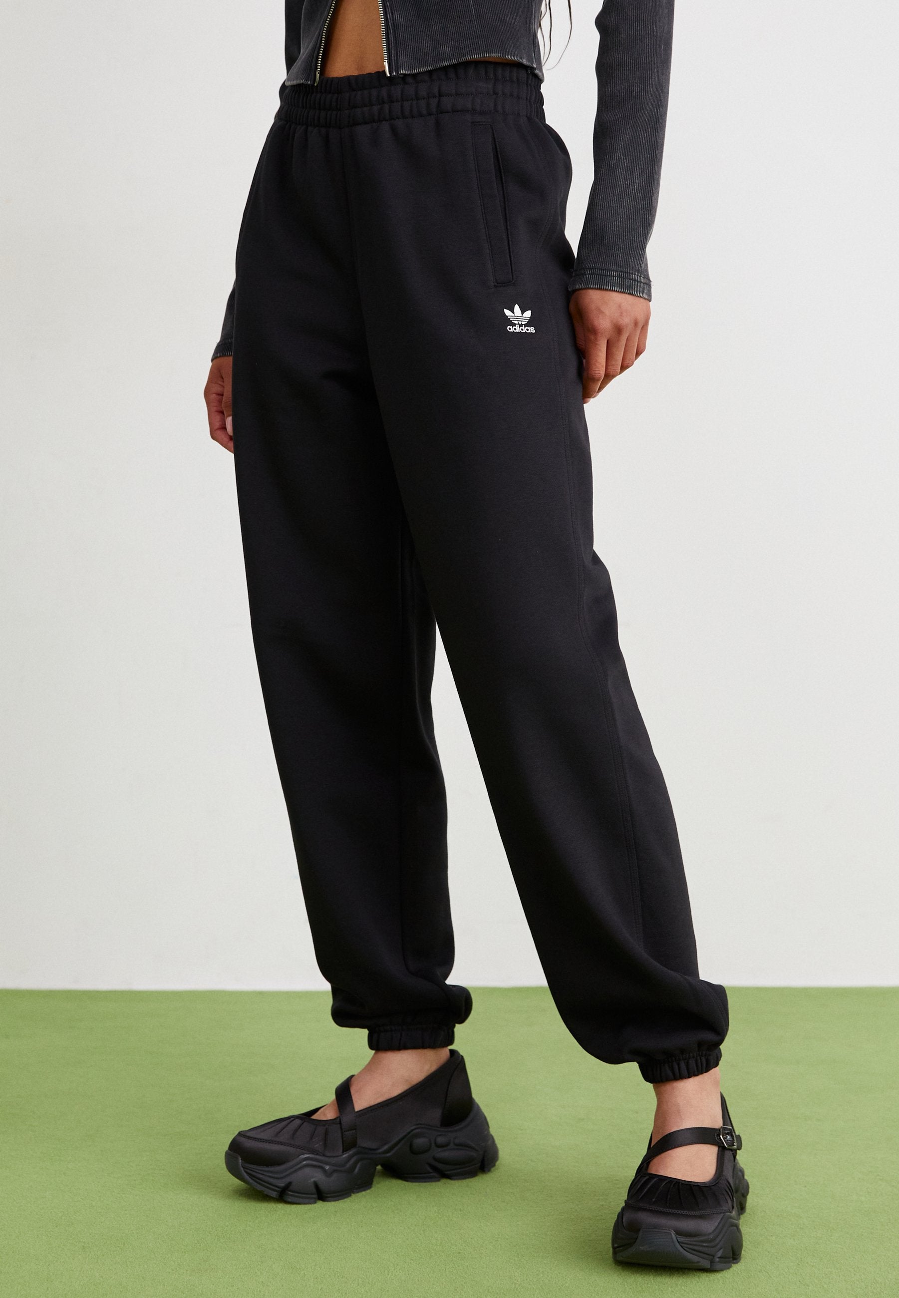 ESS JOGGERS - Tracksuit bottoms - black