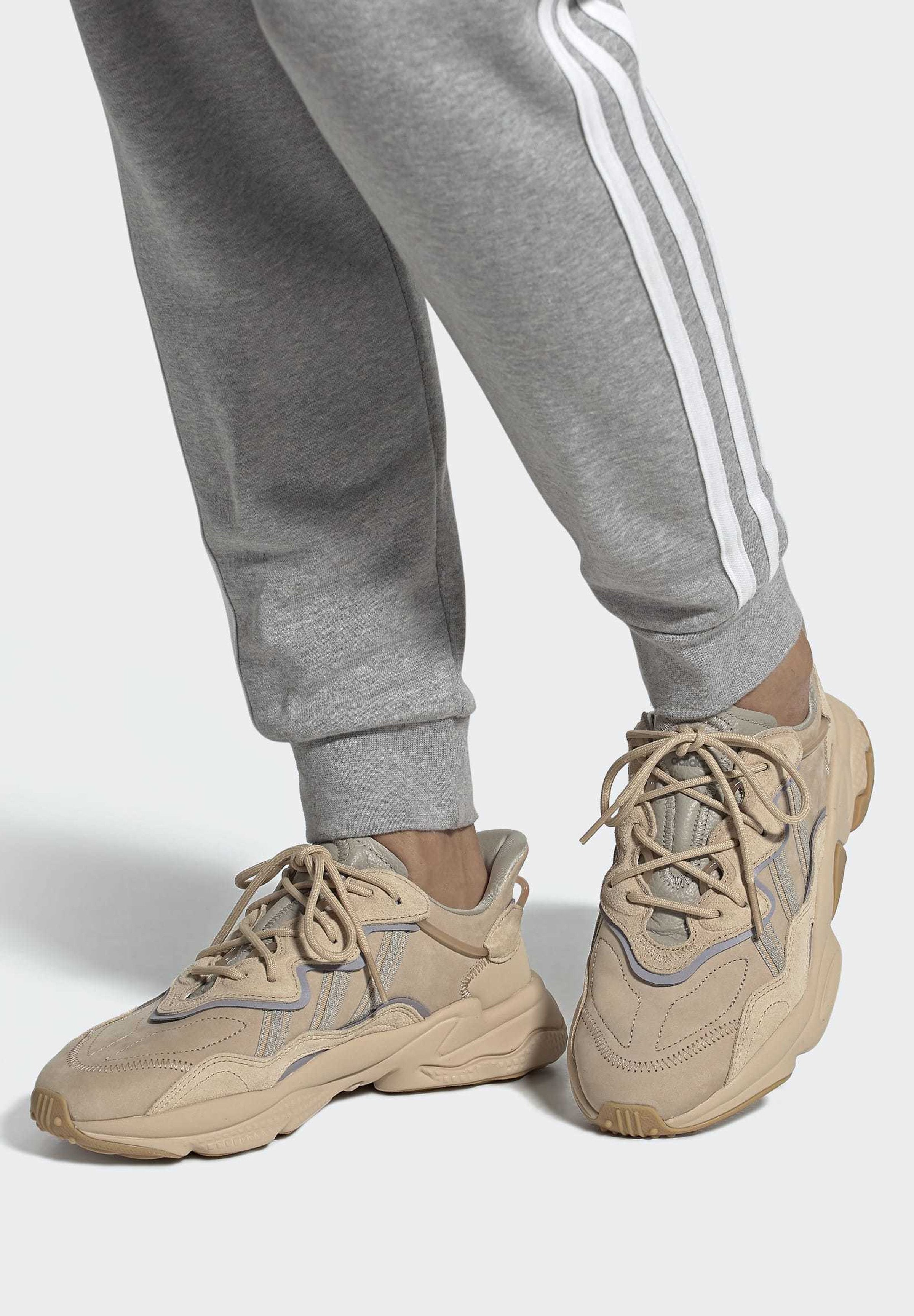 OZWEEGO UNISEX - Trainers - stpanu/lbrown/solred