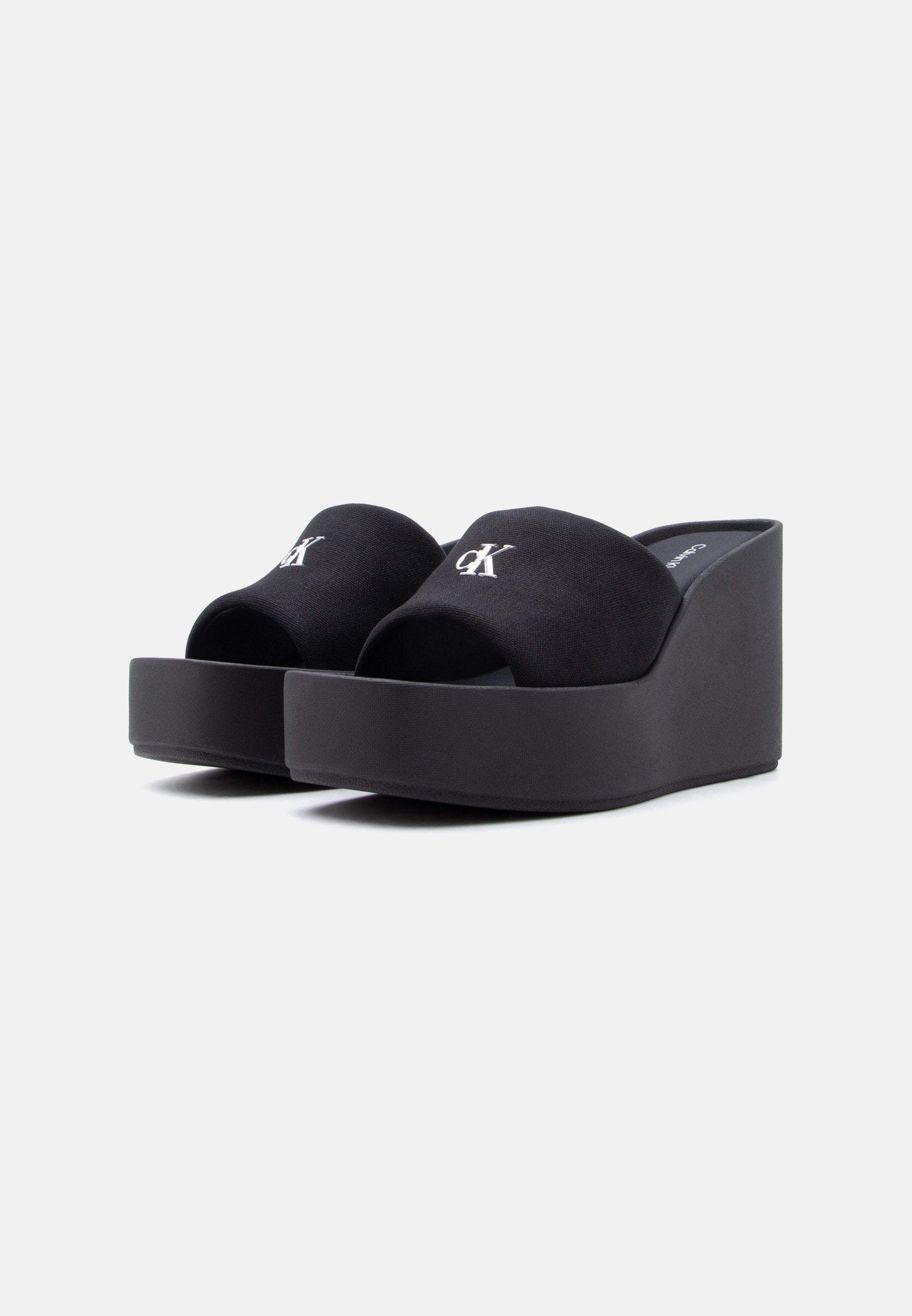 Heeled mules - triple black