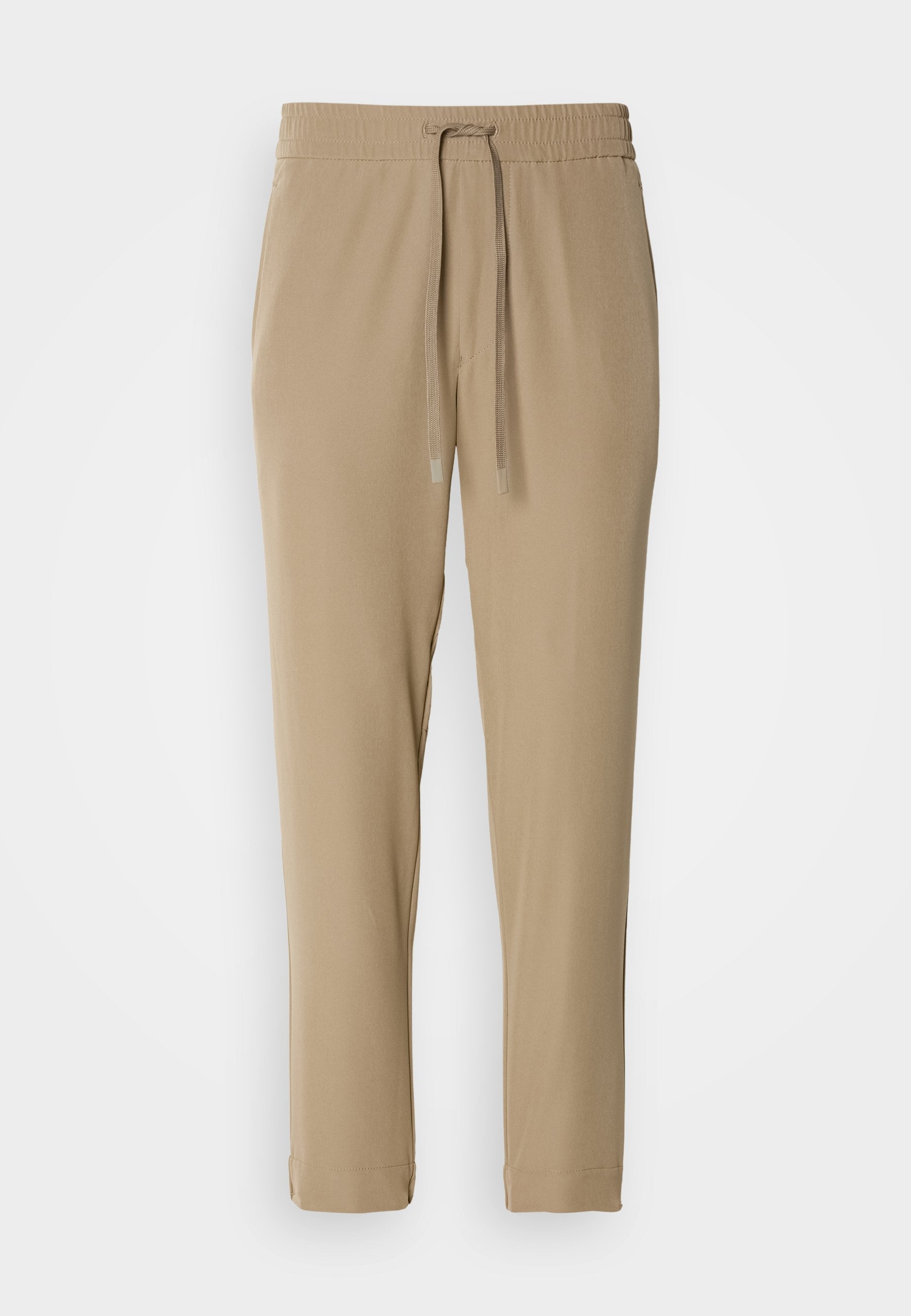 T_FLEX - Trousers - light/pastel green