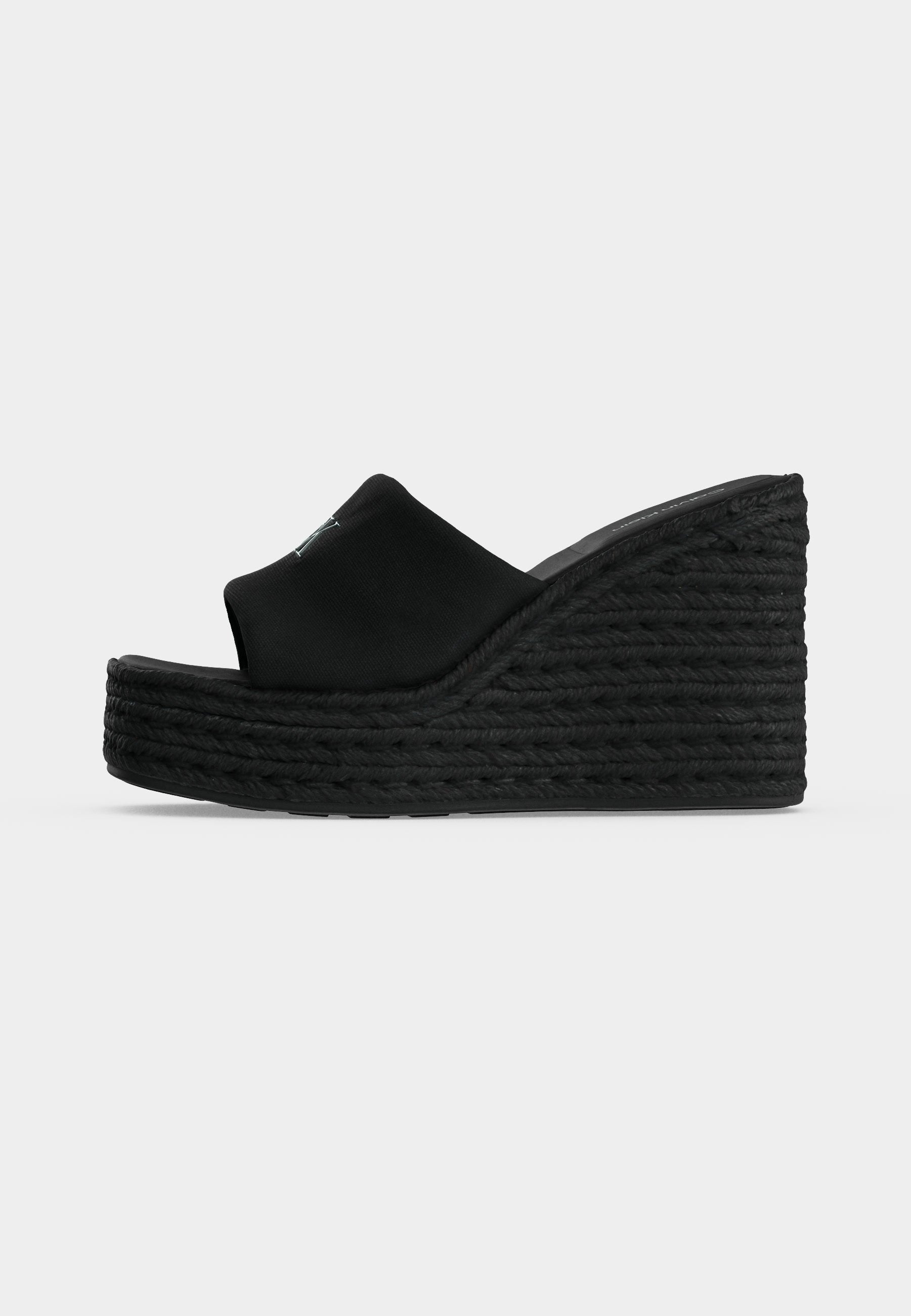 Heeled mules - black