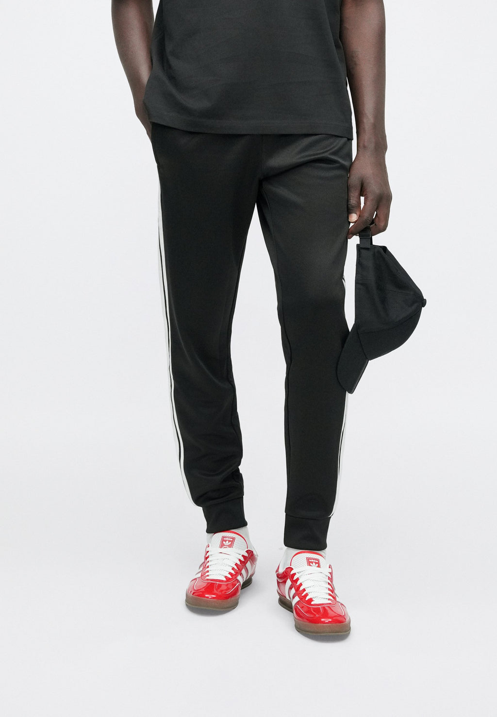 SST TP - Tracksuit bottoms - black