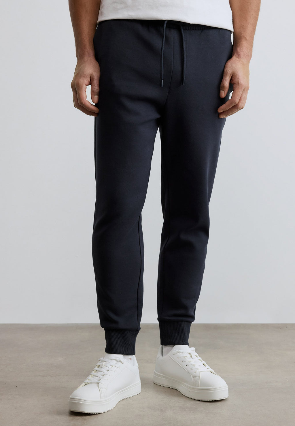 HADIKO - Tracksuit bottoms - dark blue