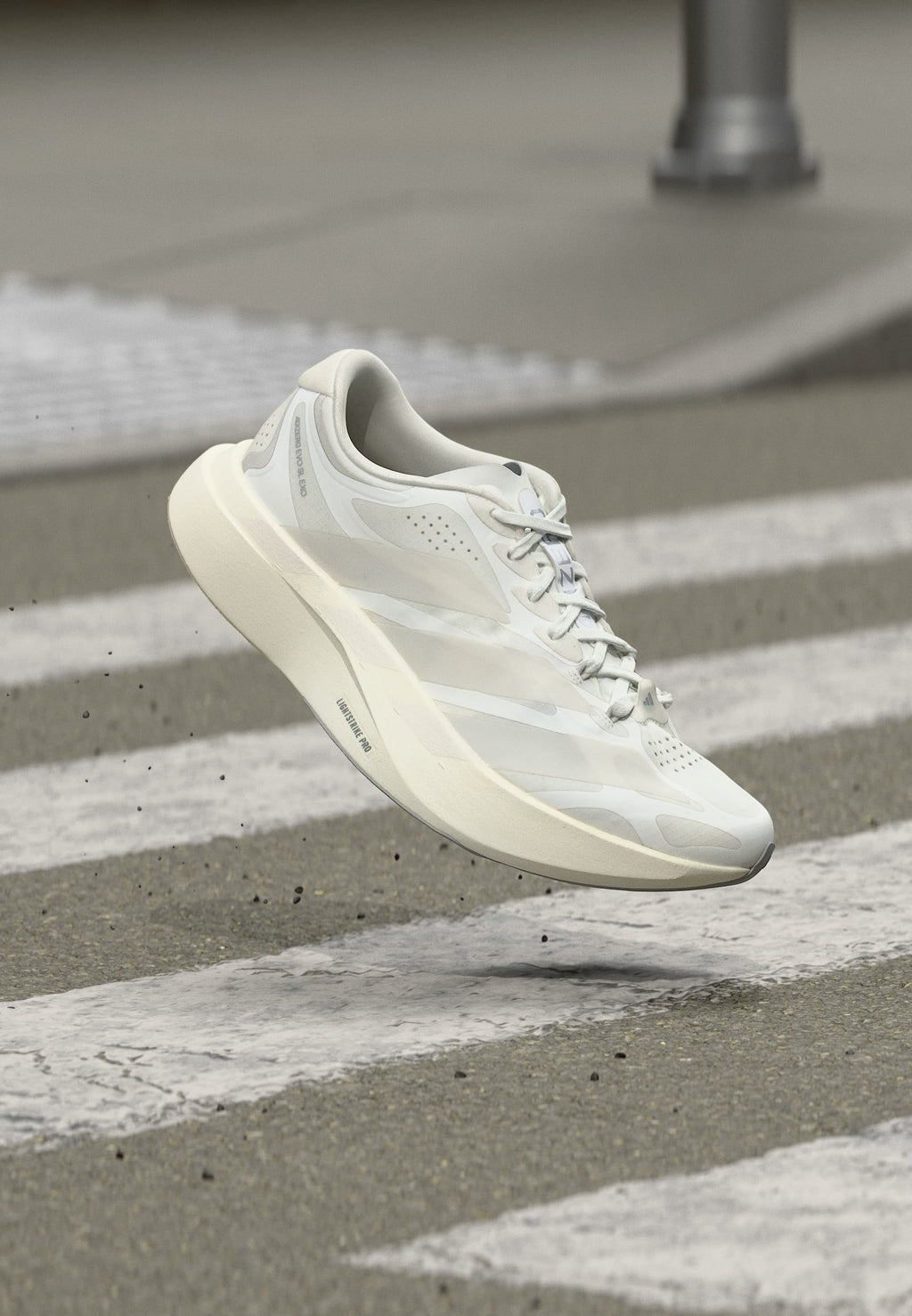 ADIZERO EVO SL EXO W - Road running shoes - footwear white/zero metallic/core white