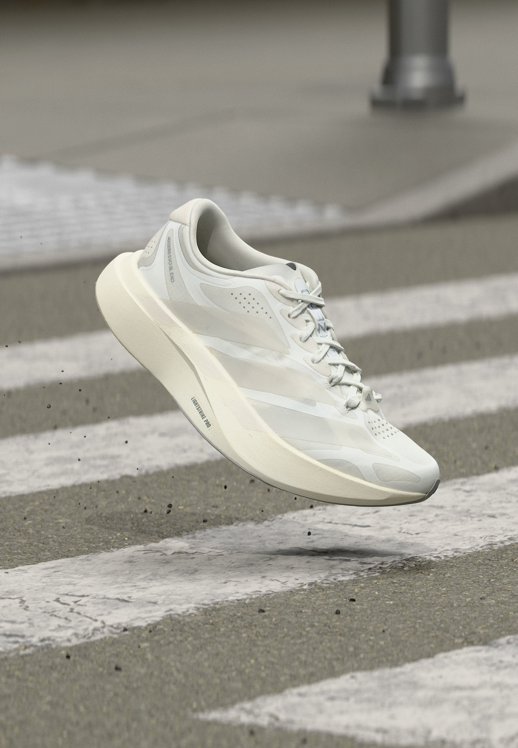 ADIZERO EVO SL EXO W - Road running shoes - footwear white/zero metallic/core white
