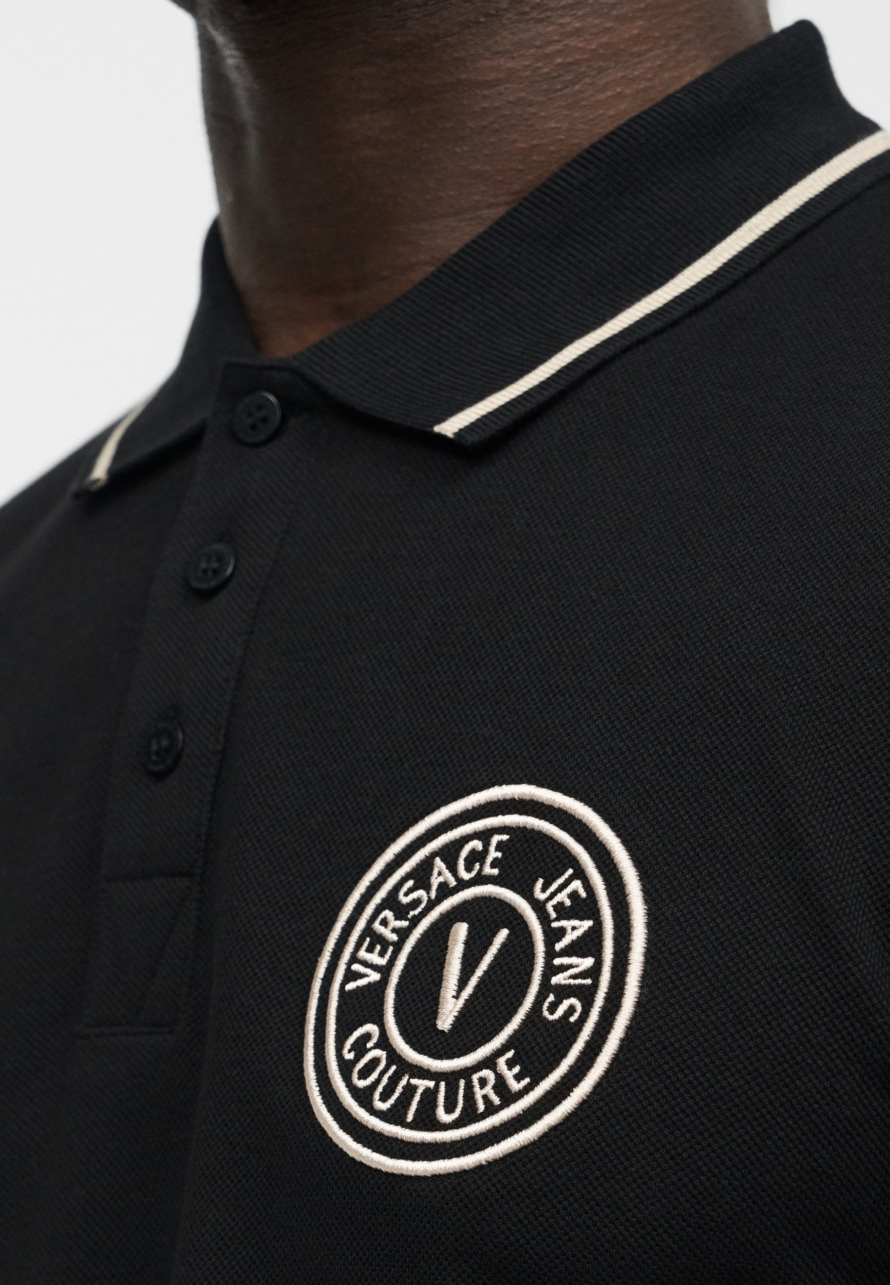 EMBLEM EMBRO - Polo shirt - black