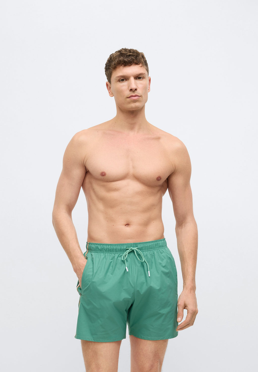 ICONIC - Swimming shorts - open green
