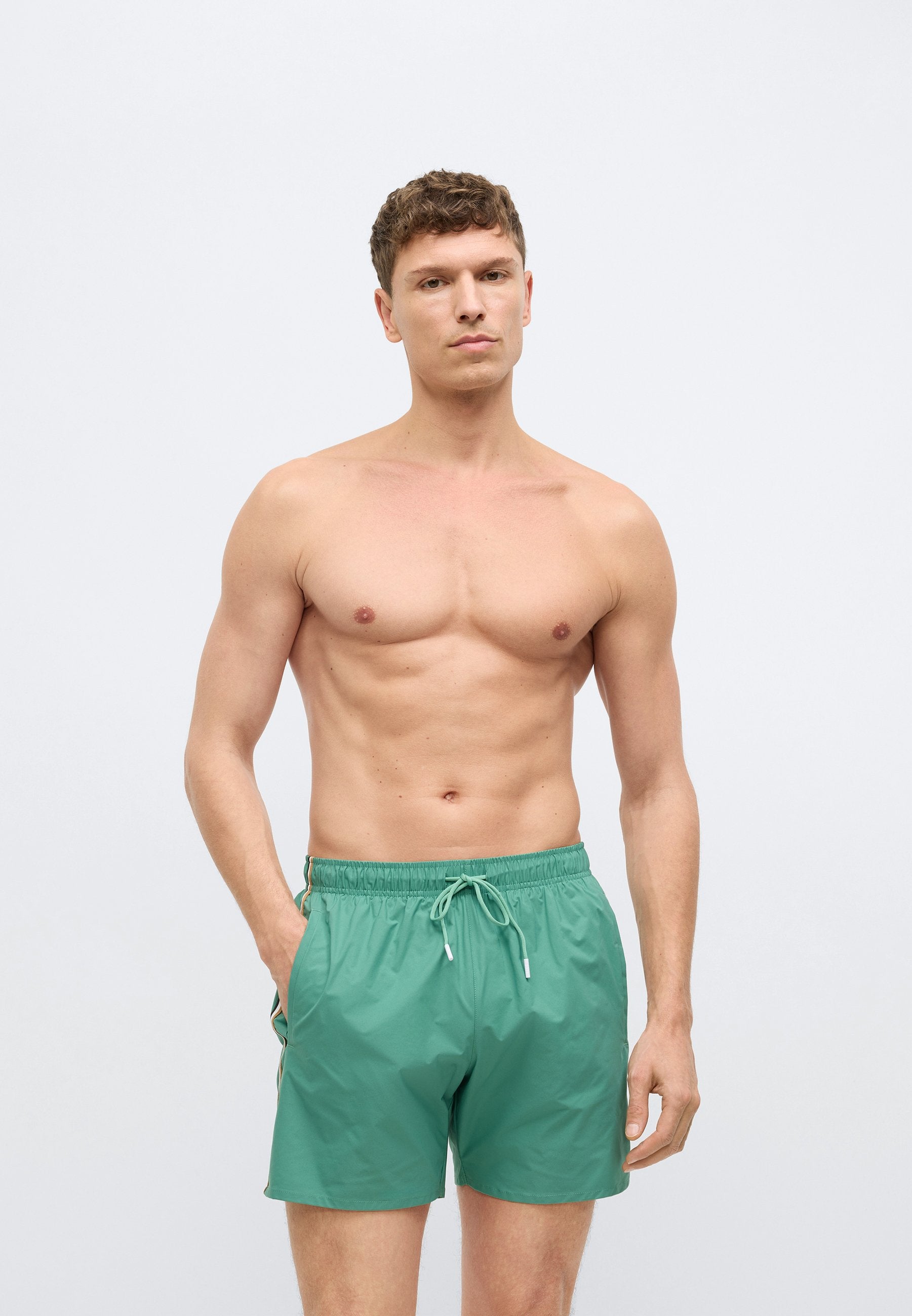 ICONIC - Swimming shorts - open green