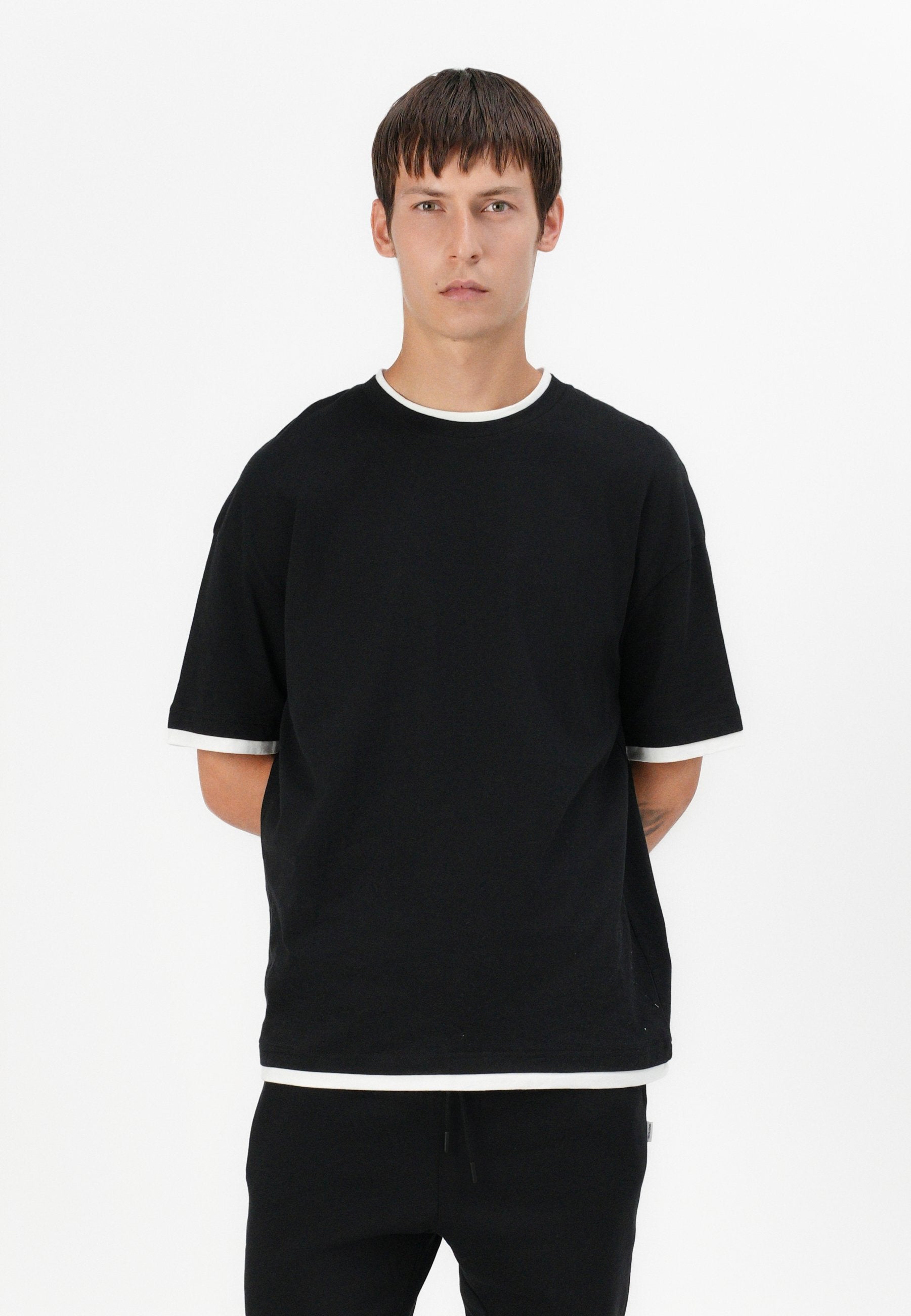 Regular Fit - Tracksuit bottoms - black