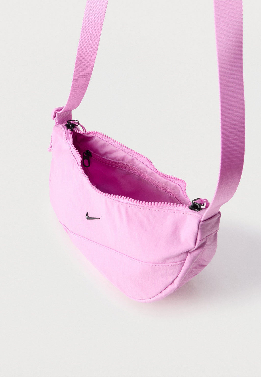 AURA CRESCENT CROSSBODY UNISEX - Cross body bag - light magenta/ black