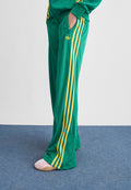FIREBIRD LOOSE - Tracksuit bottoms - bold green/yellow/off white