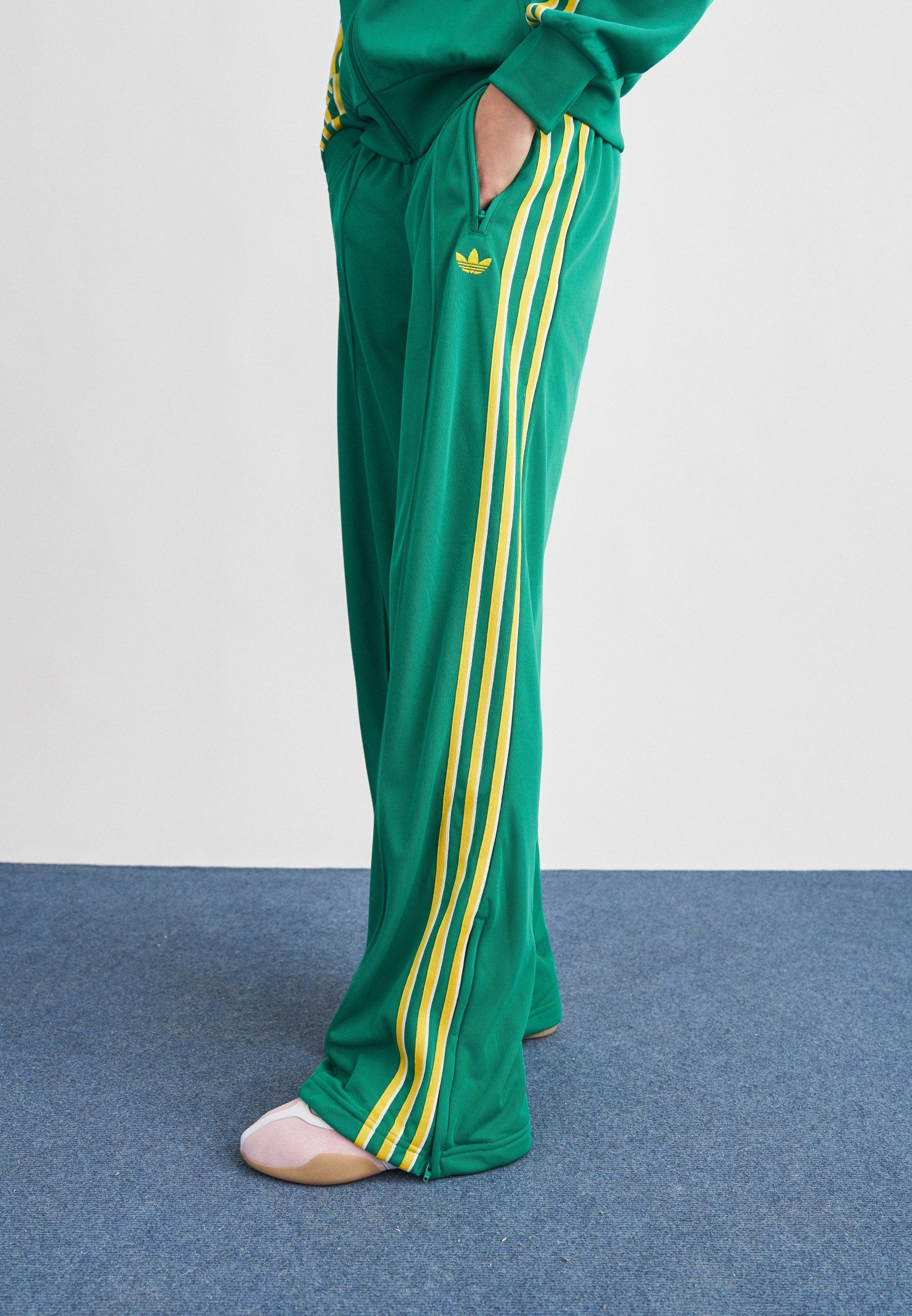FIREBIRD LOOSE - Tracksuit bottoms - bold green/yellow/off white