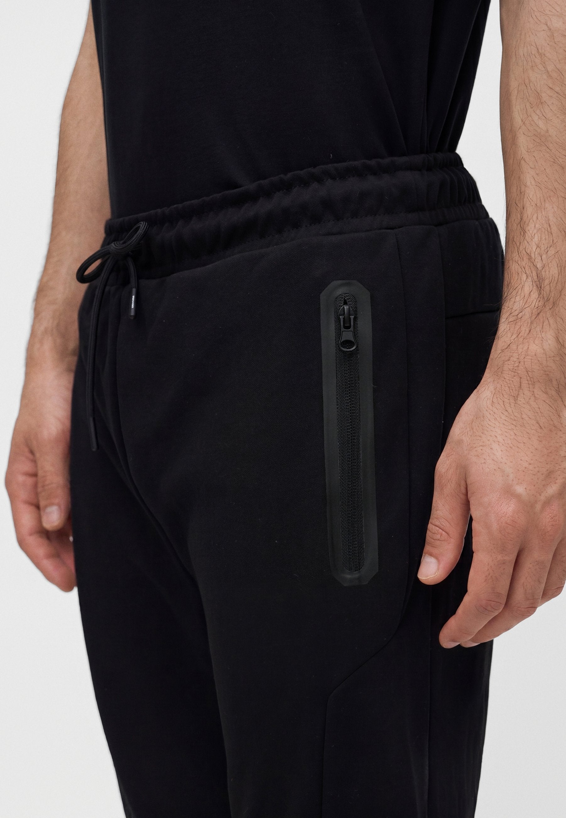 Slim Fit - Tracksuit bottoms - black