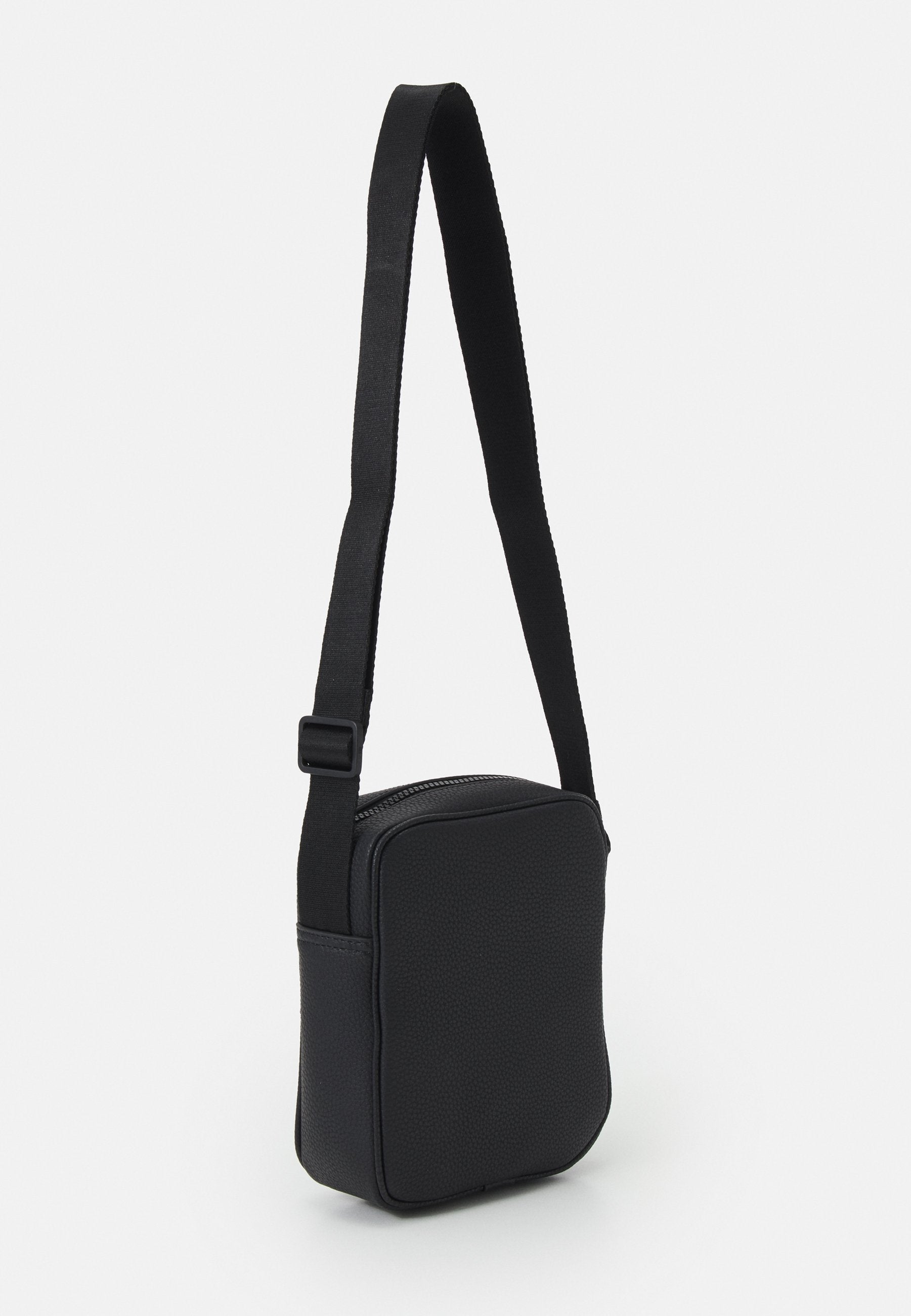ESSENTIAL MINI REPORTER UNISEX - Cross body bag - black