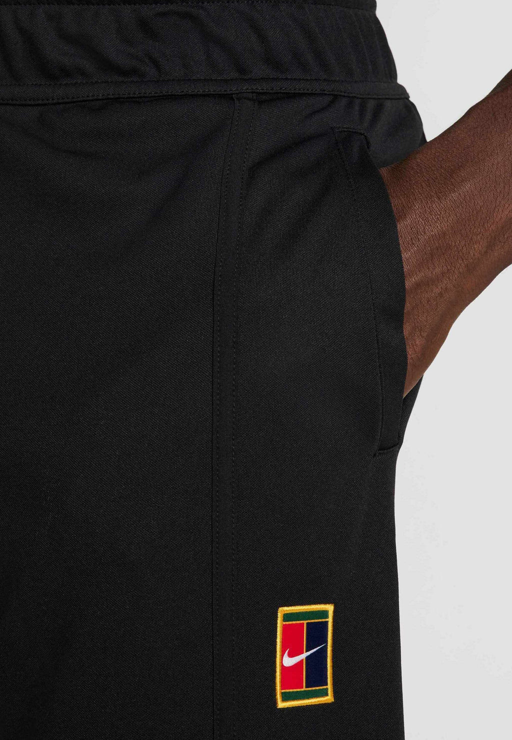 HERITAGE - Tracksuit bottoms - black black