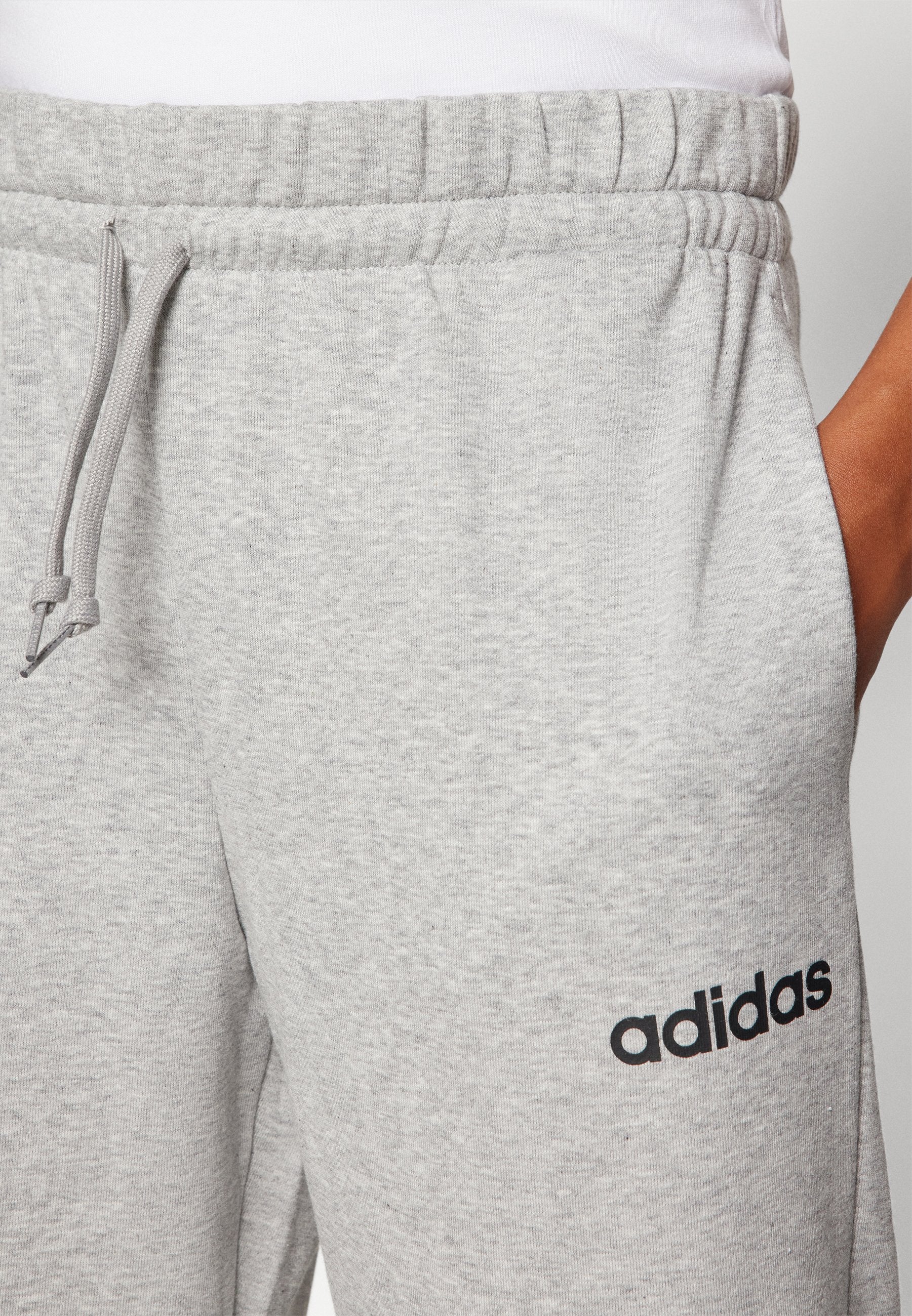 ESSENTIALS LINEAR FRENCH TERRY CUFFED - Tracksuit bottoms - medium grey heather/black