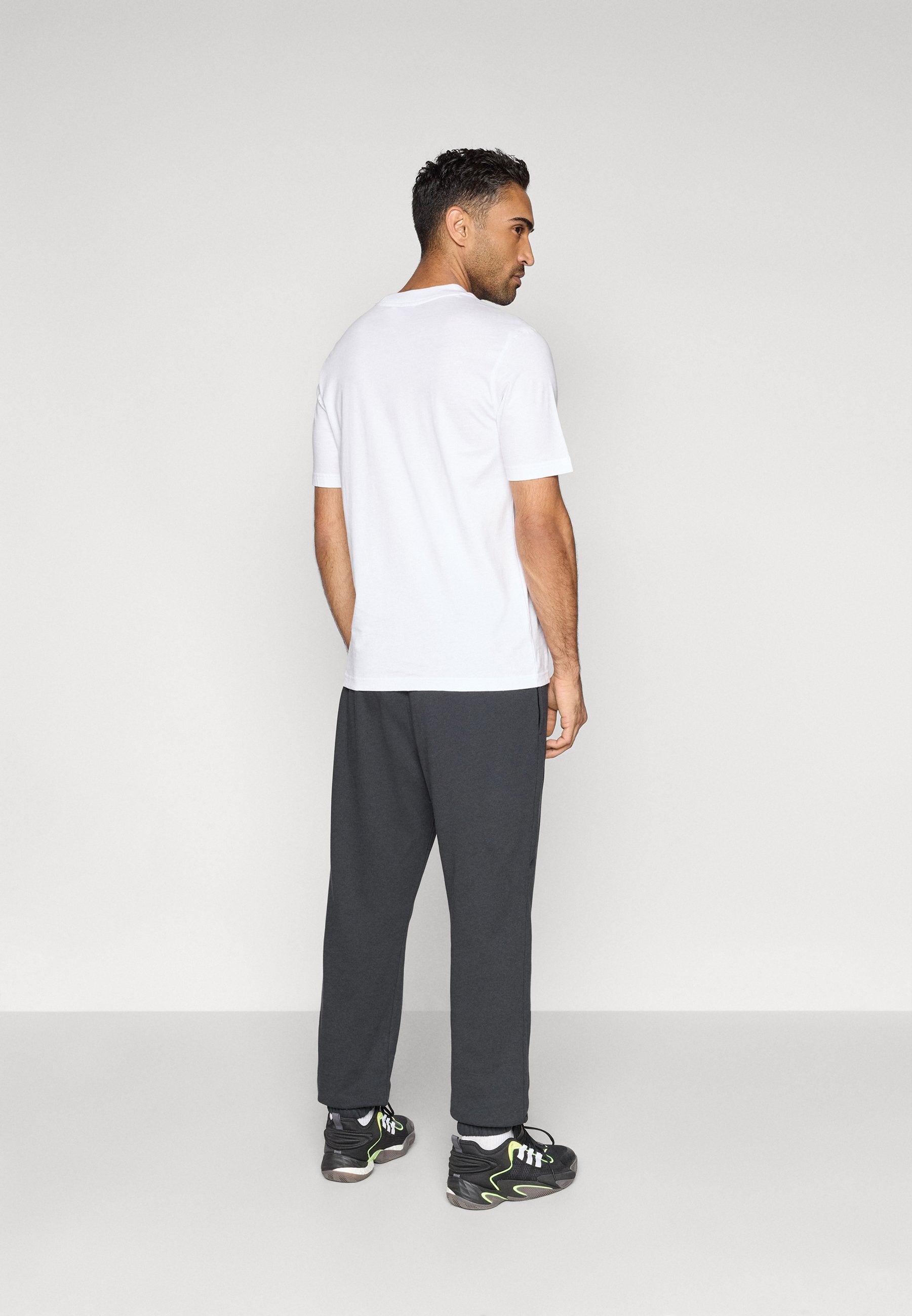 ANTHONY EDWARDS PANT - Tracksuit bottoms - black