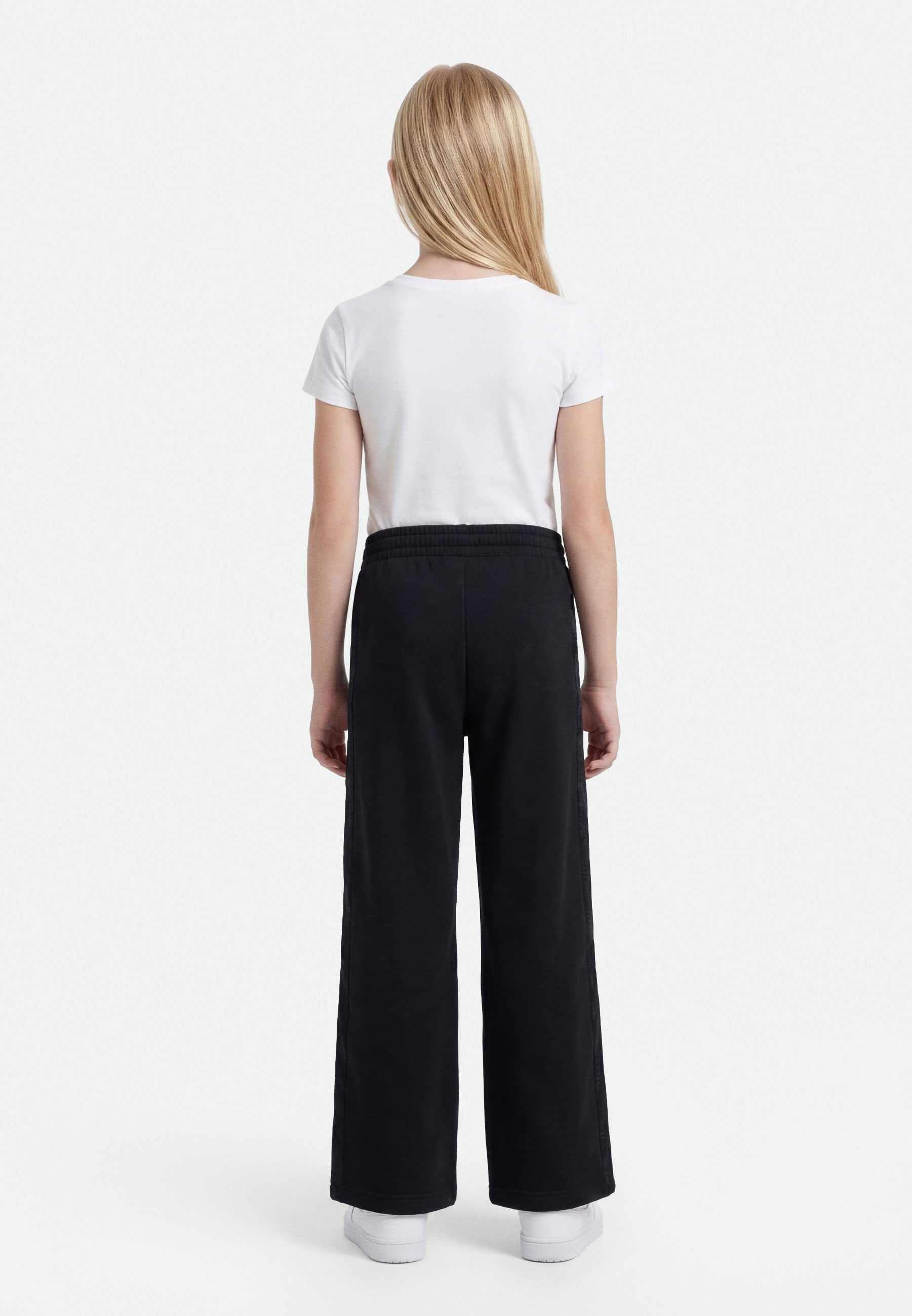 LOOSE - Tracksuit bottoms - black