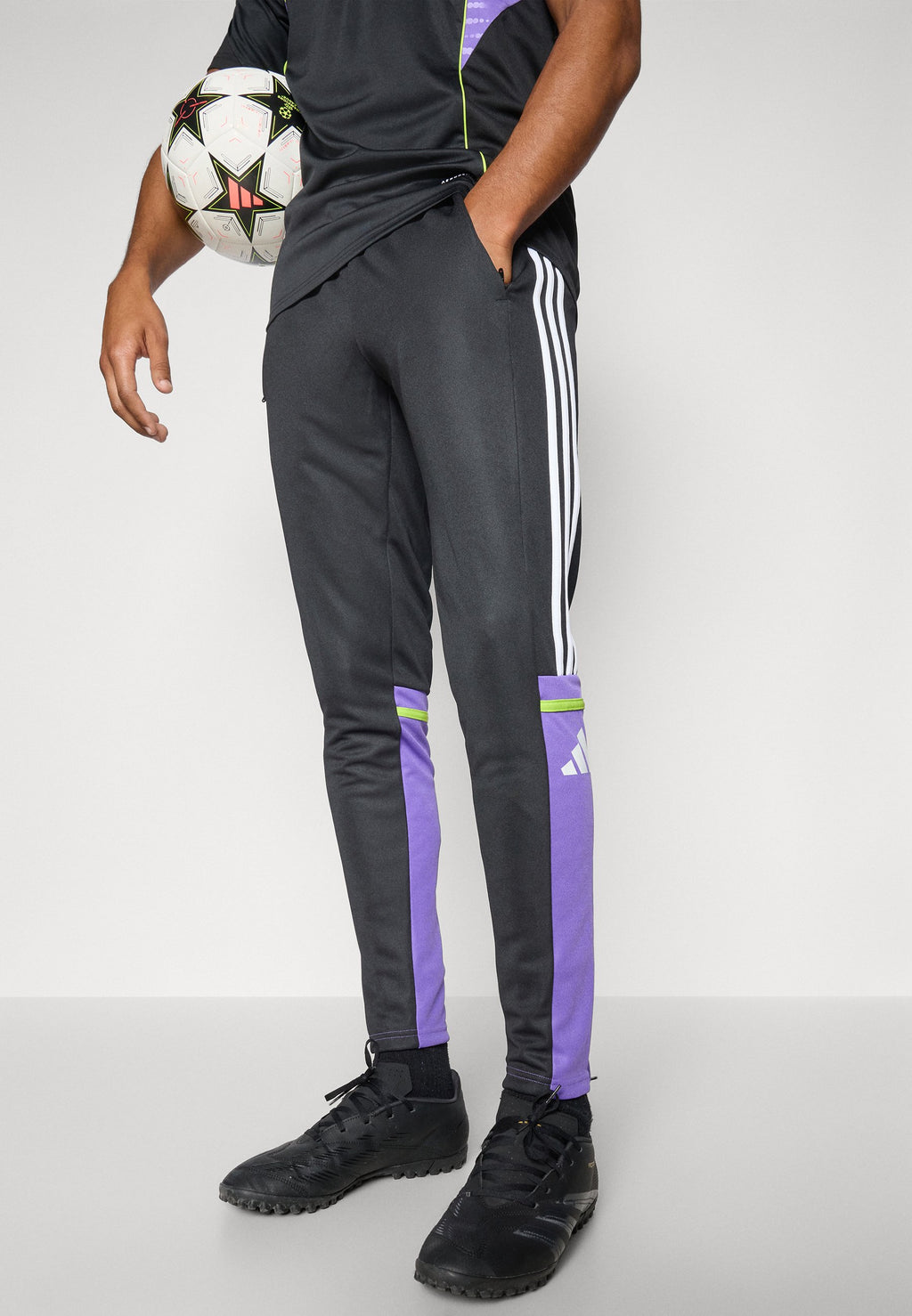 SQUADRA REGULAR FIT - Tracksuit bottoms - black/purple rush