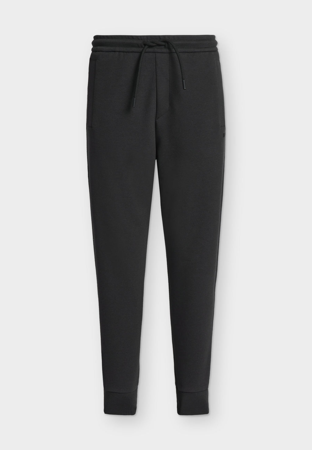 UNION HADIKO - Tracksuit bottoms - dark blue