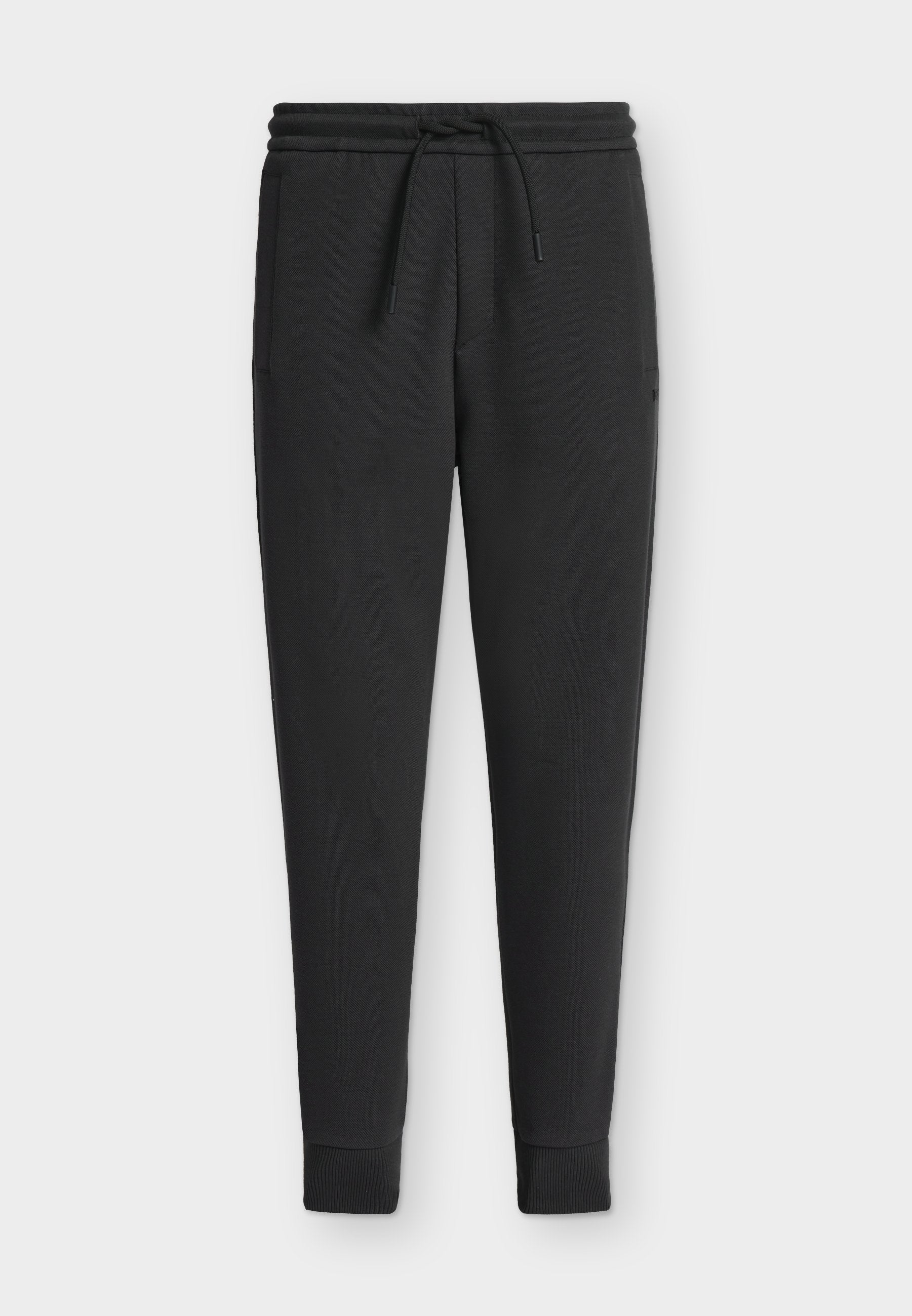 UNION HADIKO - Tracksuit bottoms - dark blue