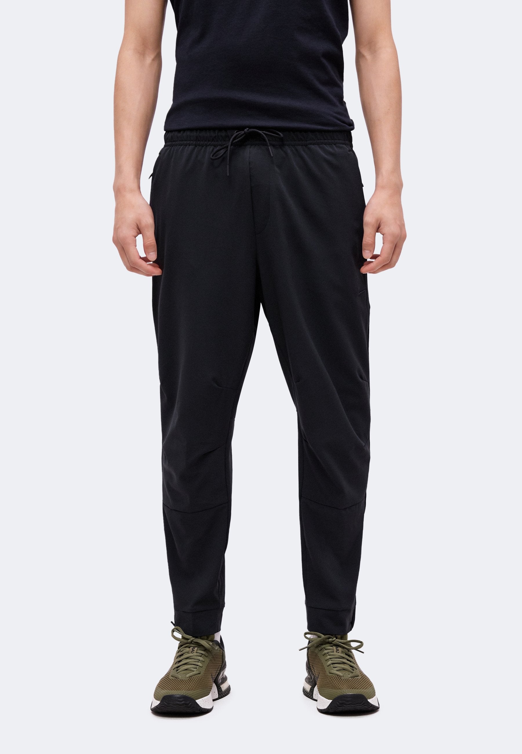UNLIMITED - Tracksuit bottoms - black